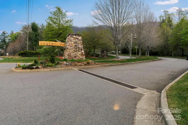 a view of a porch with furniture and a fireplace