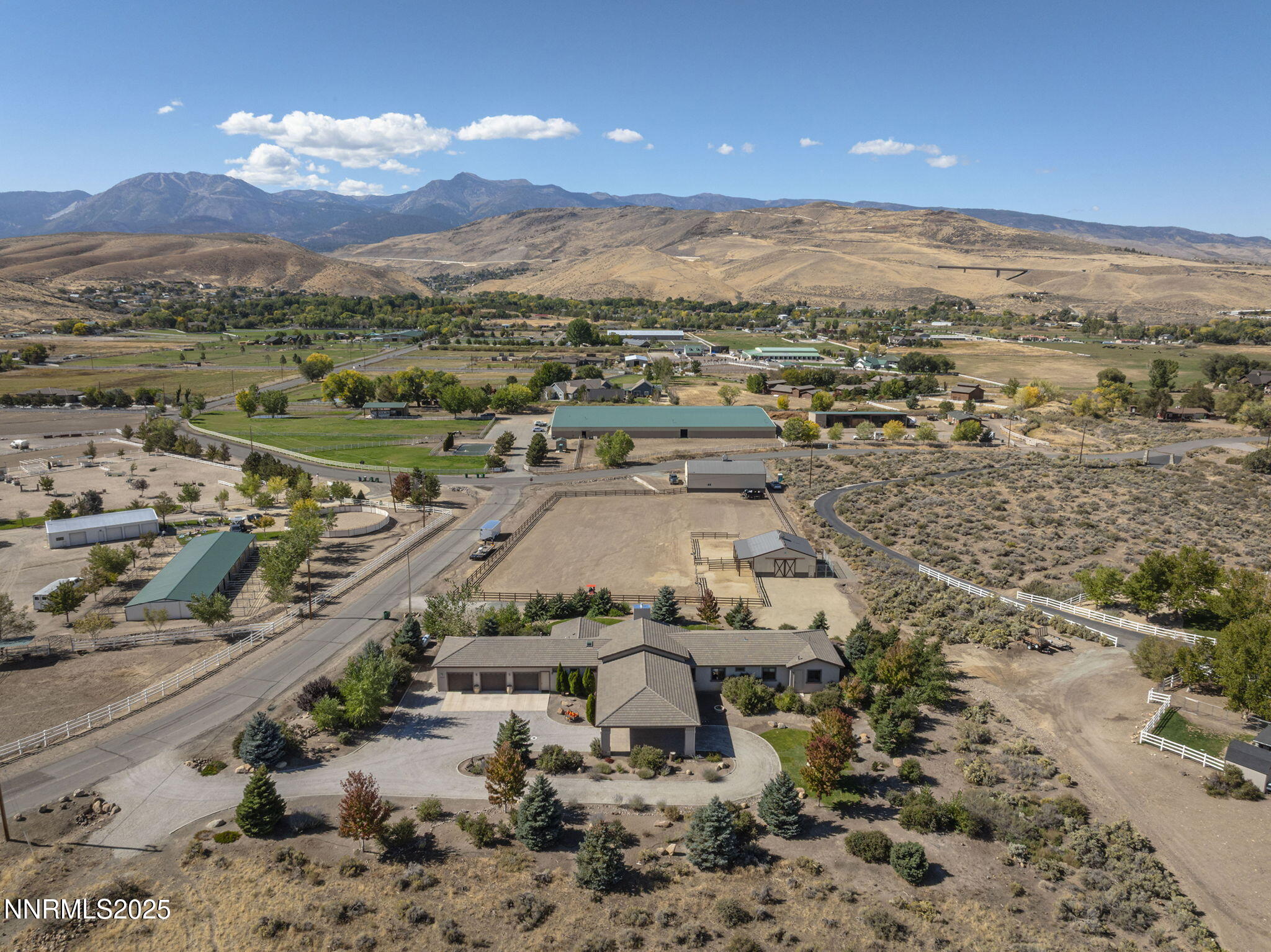 1255 Willomonte Road Reno, NV 89521 - Photo 53 of 70 an aerial view of a house with a mountain