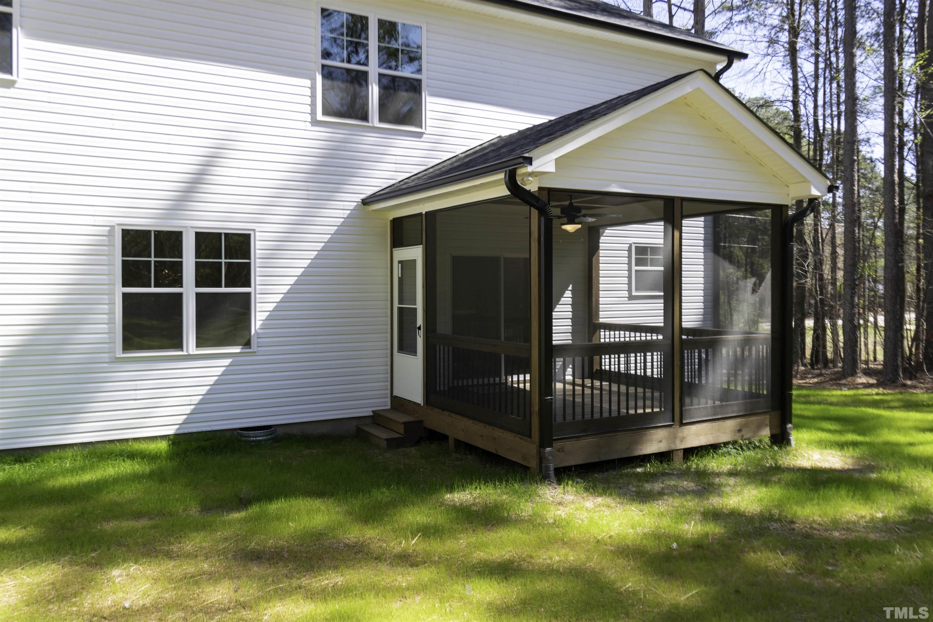 2758 Sledge Road Louisburg, NC 27549 - Photo 2 of 38 a view of backyard with deck