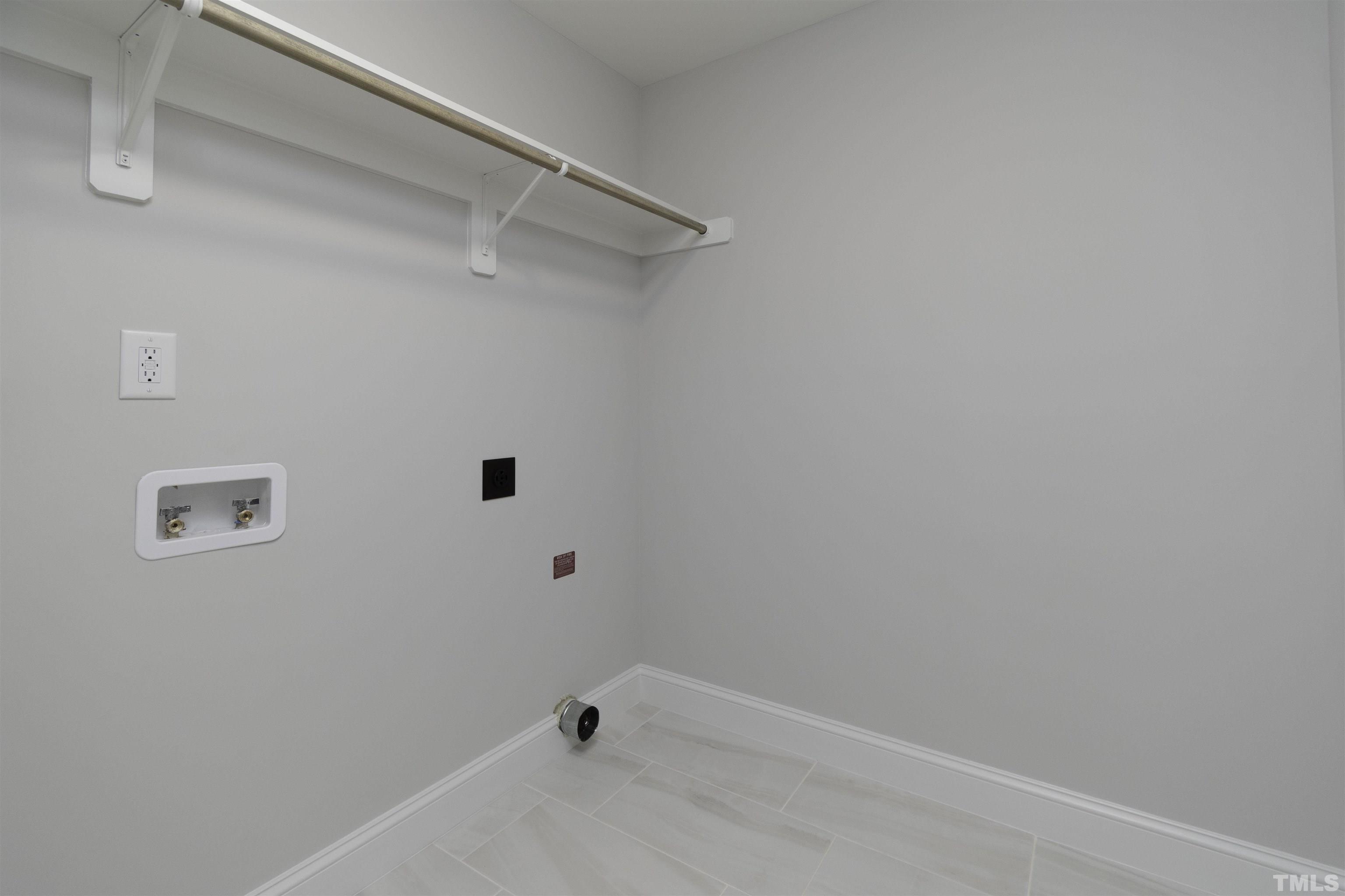 2758 Sledge Road Louisburg, NC 27549 - Photo 25 of 38 a view of small space with racks on the wall