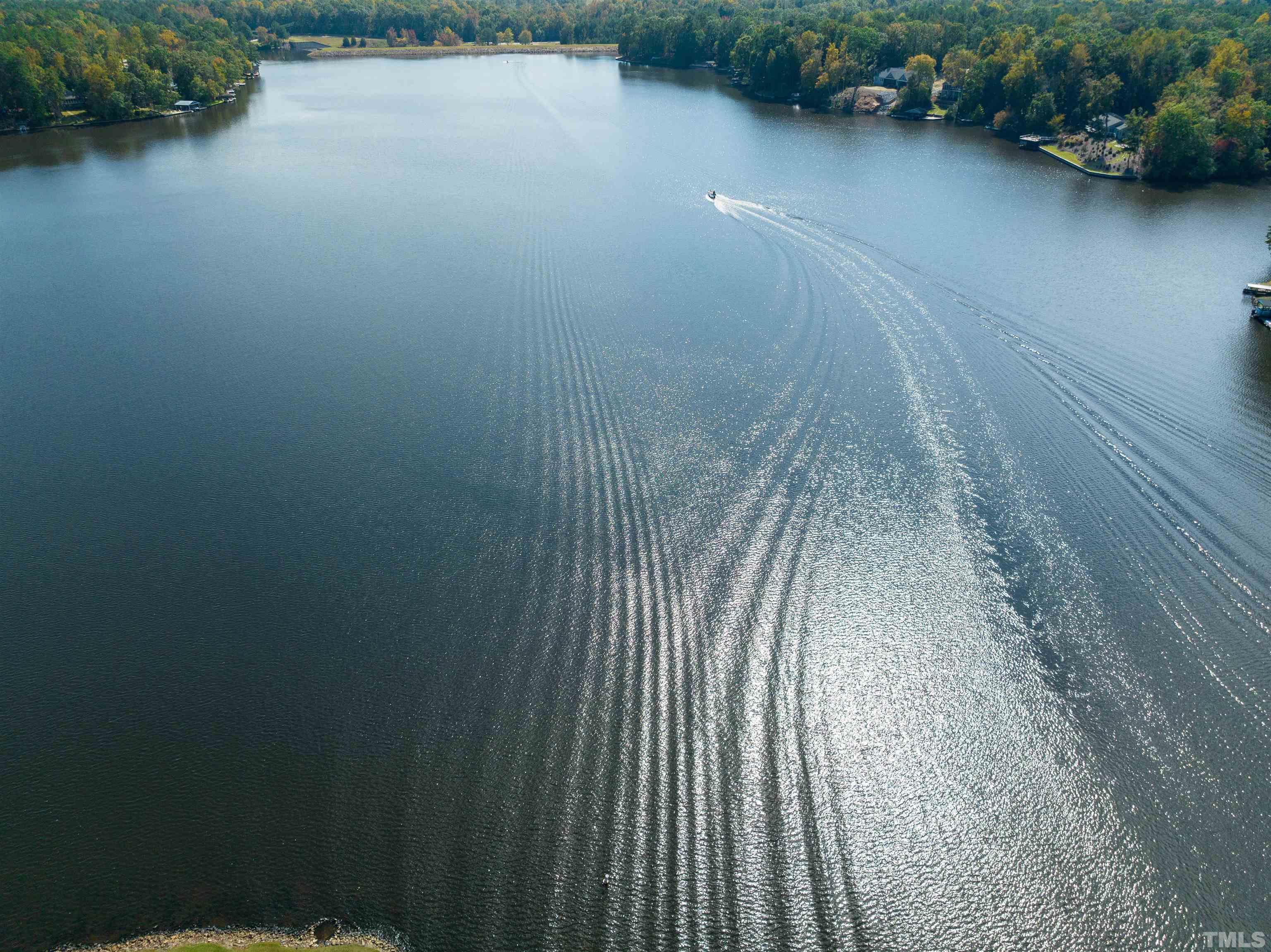 2758 Sledge Road Louisburg, NC 27549 - Photo 33 of 38 a view of a room with plants and lake view