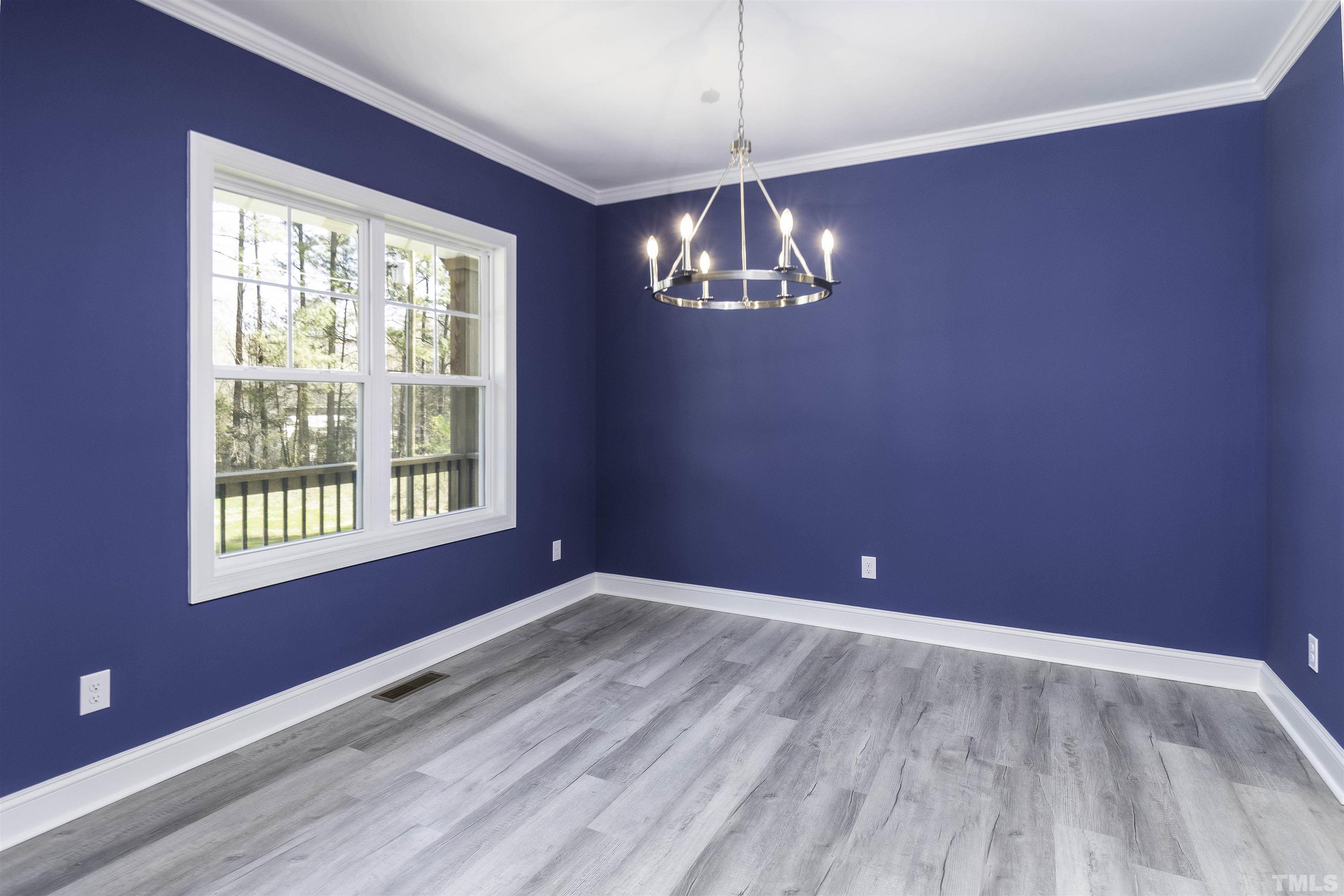 2758 Sledge Road Louisburg, NC 27549 - Photo 5 of 38 a view of empty room with wooden floor and fan