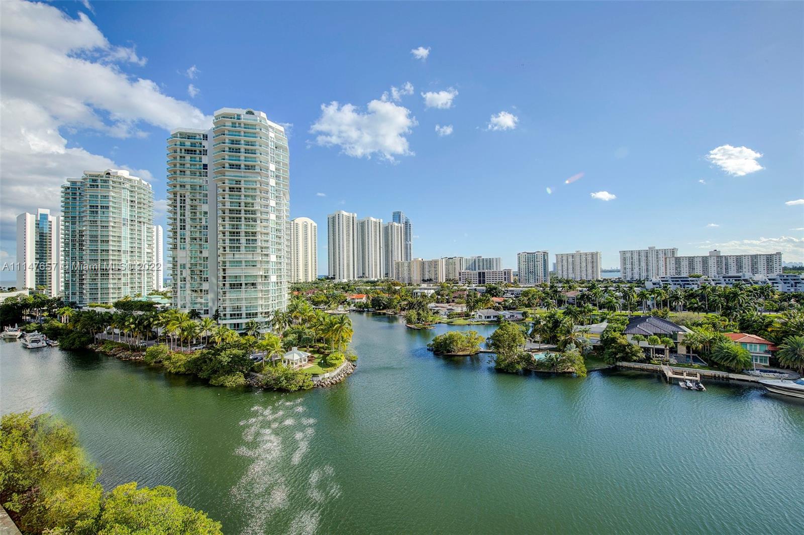 330 Sunny Isles Boulevard, Unit 5802 Sunny Isles Beach, FL 33160 - Photo 2 of 34 a view of a lake with a city