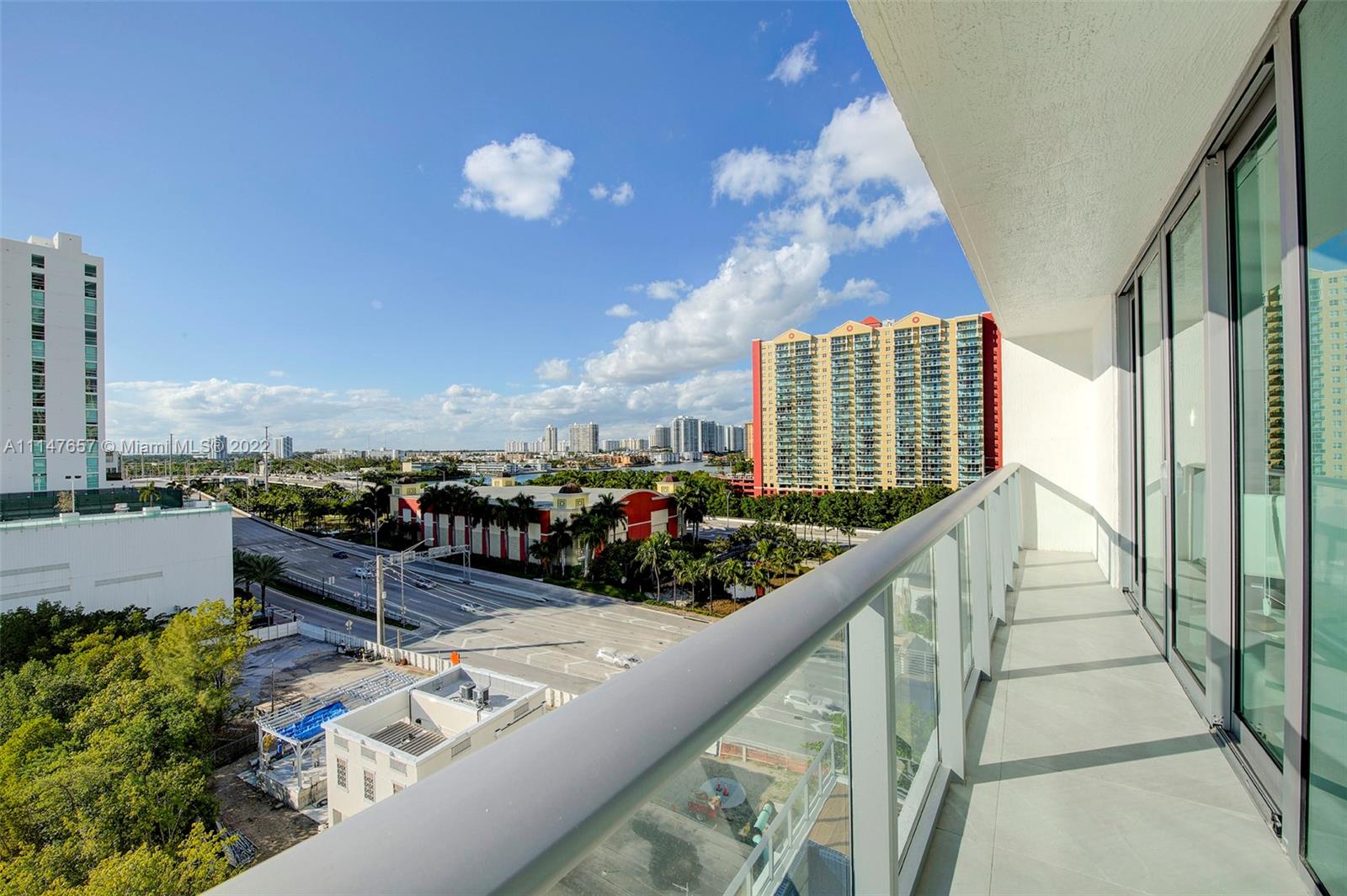 330 Sunny Isles Boulevard, Unit 5802 Sunny Isles Beach, FL 33160 - Photo 30 of 34 a view of a balcony with lake view