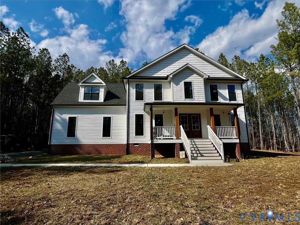 2267 Carys Creek Rd Fork Union Fork Union, VA 23055 - Photo 1 of 25 a front view of a house with a yard