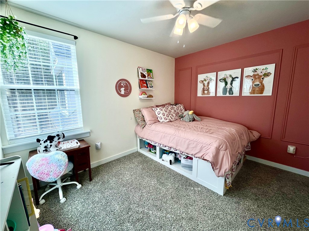 2267 Carys Creek Rd Fork Union Fork Union, VA 23055 - Photo 23 of 25 a bedroom with a bed and a chandelier