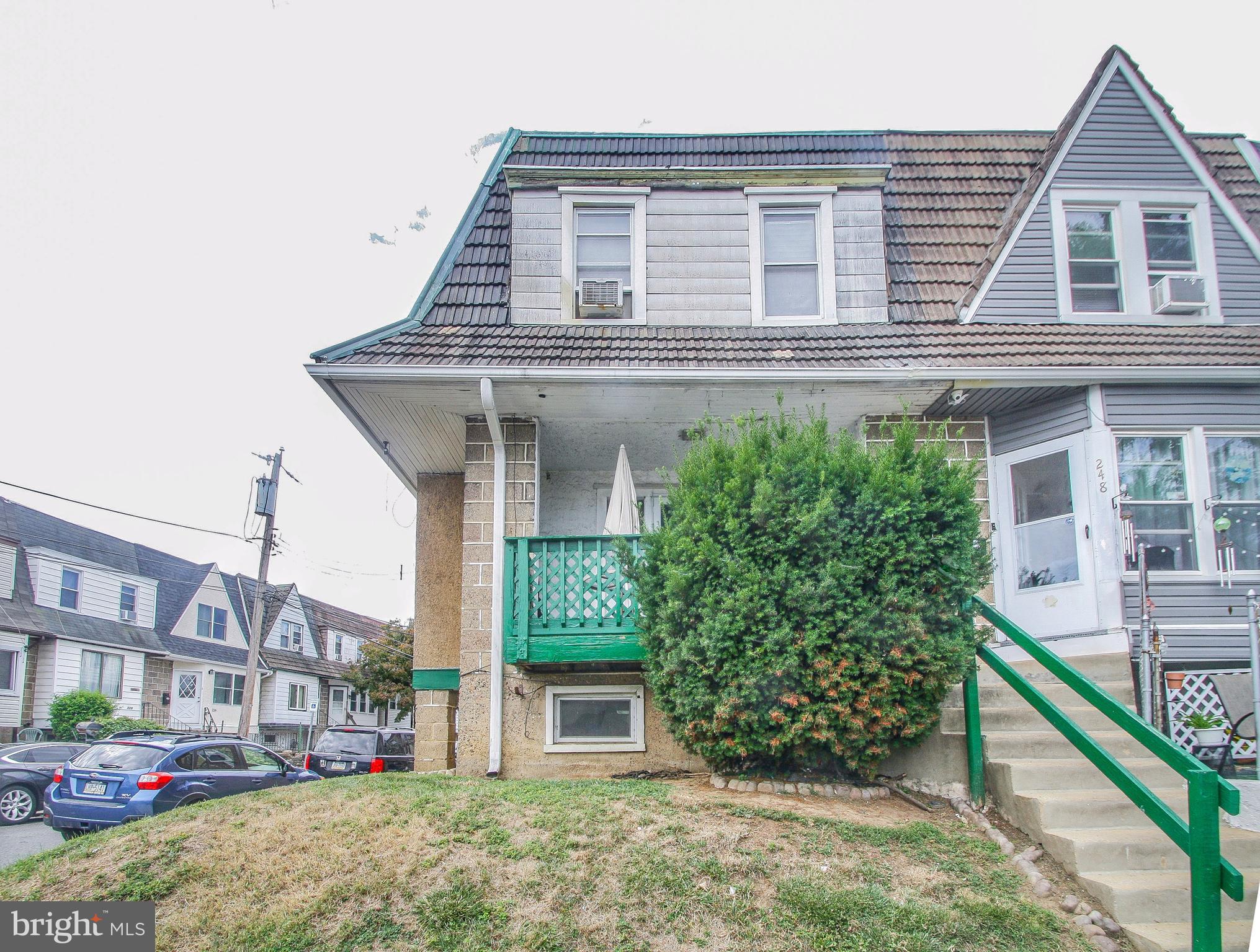 246 Coverly Road Lansdowne, PA 19050 - Photo 1 of 31 a front view of a house with a garden