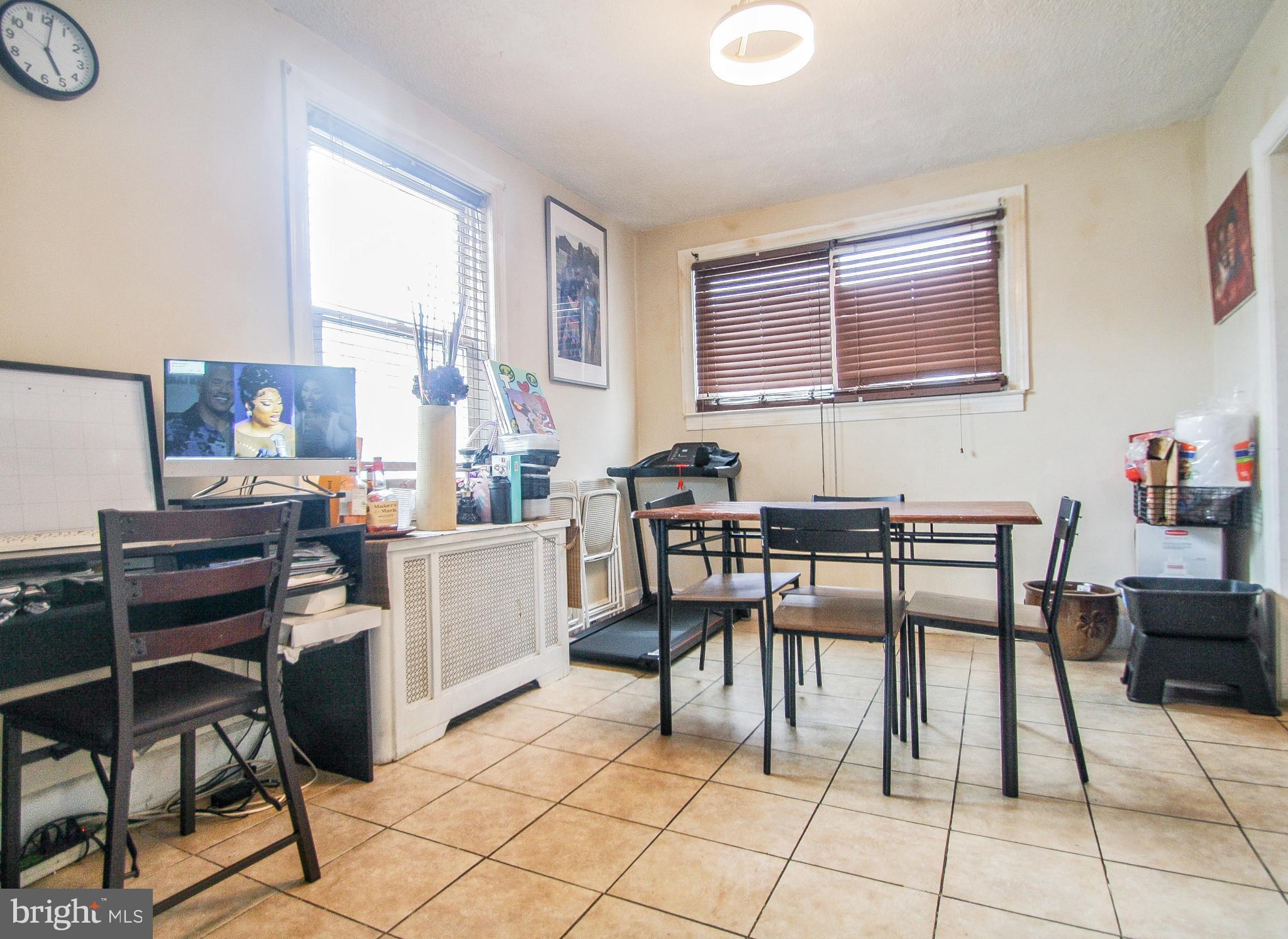 246 Coverly Road Lansdowne, PA 19050 - Photo 11 of 31 a dining room that has a table and chairs in it