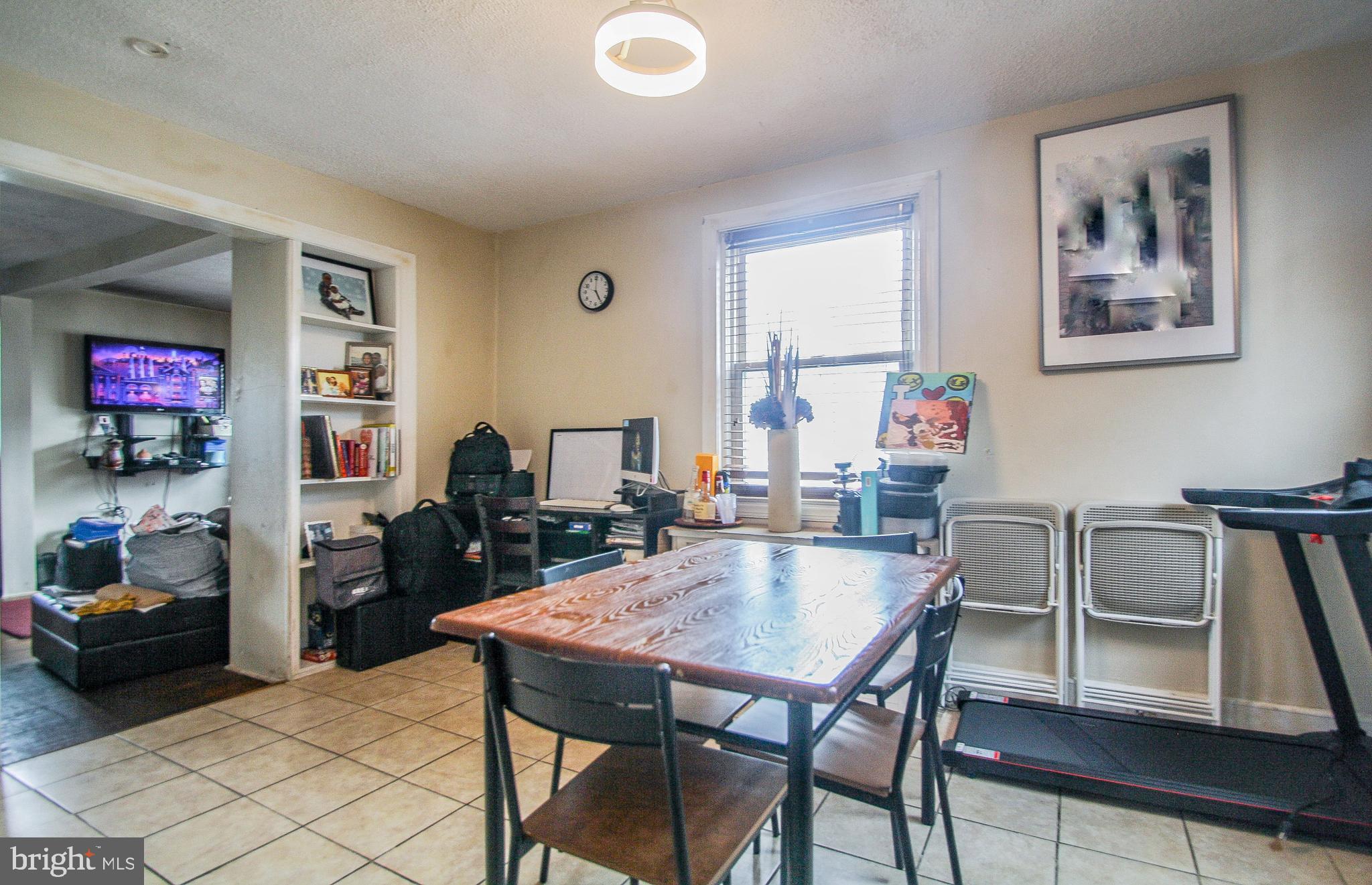 246 Coverly Road Lansdowne, PA 19050 - Photo 13 of 31 a view of a dining room with furniture and a chandelier