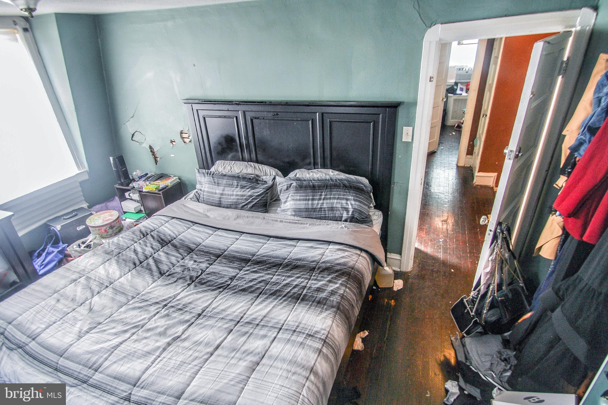 246 Coverly Road Lansdowne, PA 19050 - Photo 27 of 31 a bedroom with a bed and a mirror on dresser