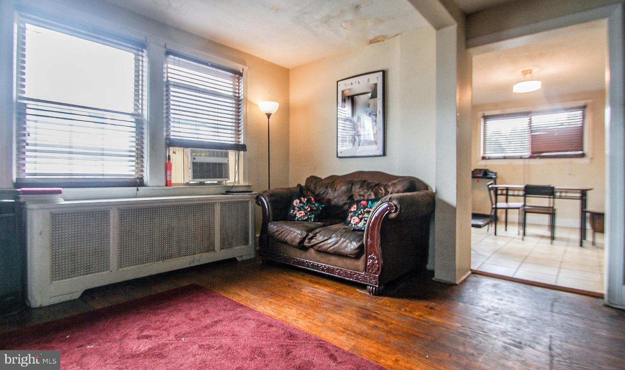 246 Coverly Road Lansdowne, PA 19050 - Photo 5 of 31 a living room with furniture and a window