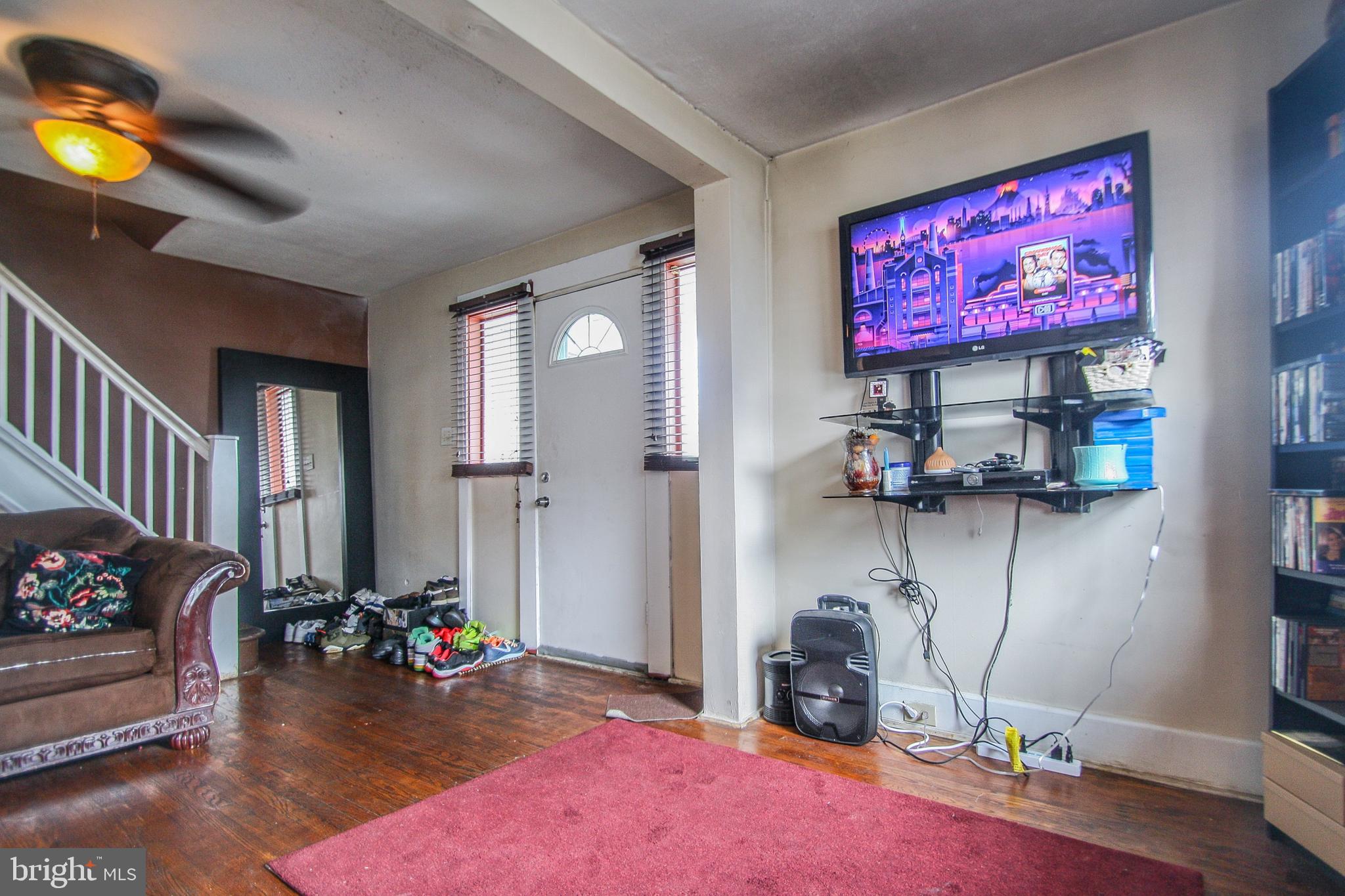 246 Coverly Road Lansdowne, PA 19050 - Photo 8 of 31 a living room with furniture and a flat screen tv