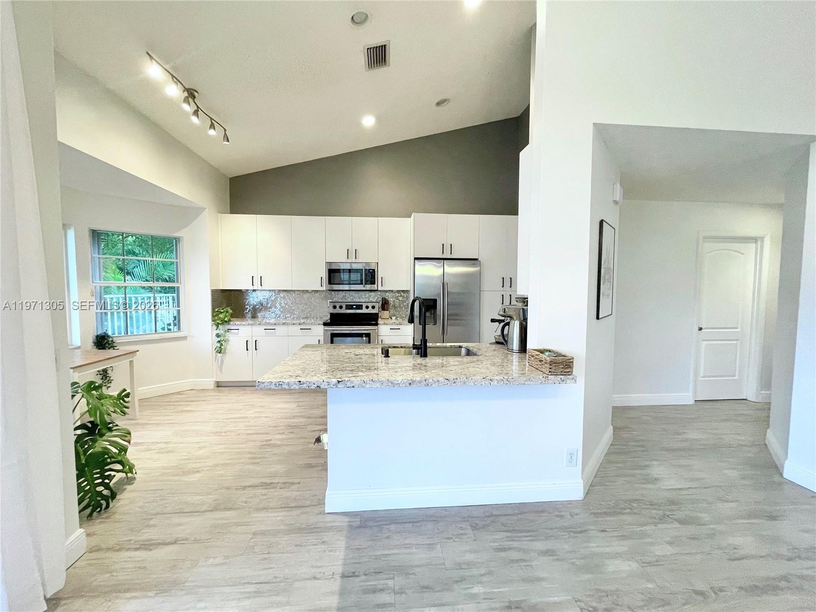 1540 Seabay Road Weston, FL 33326 - Photo 8 of 32