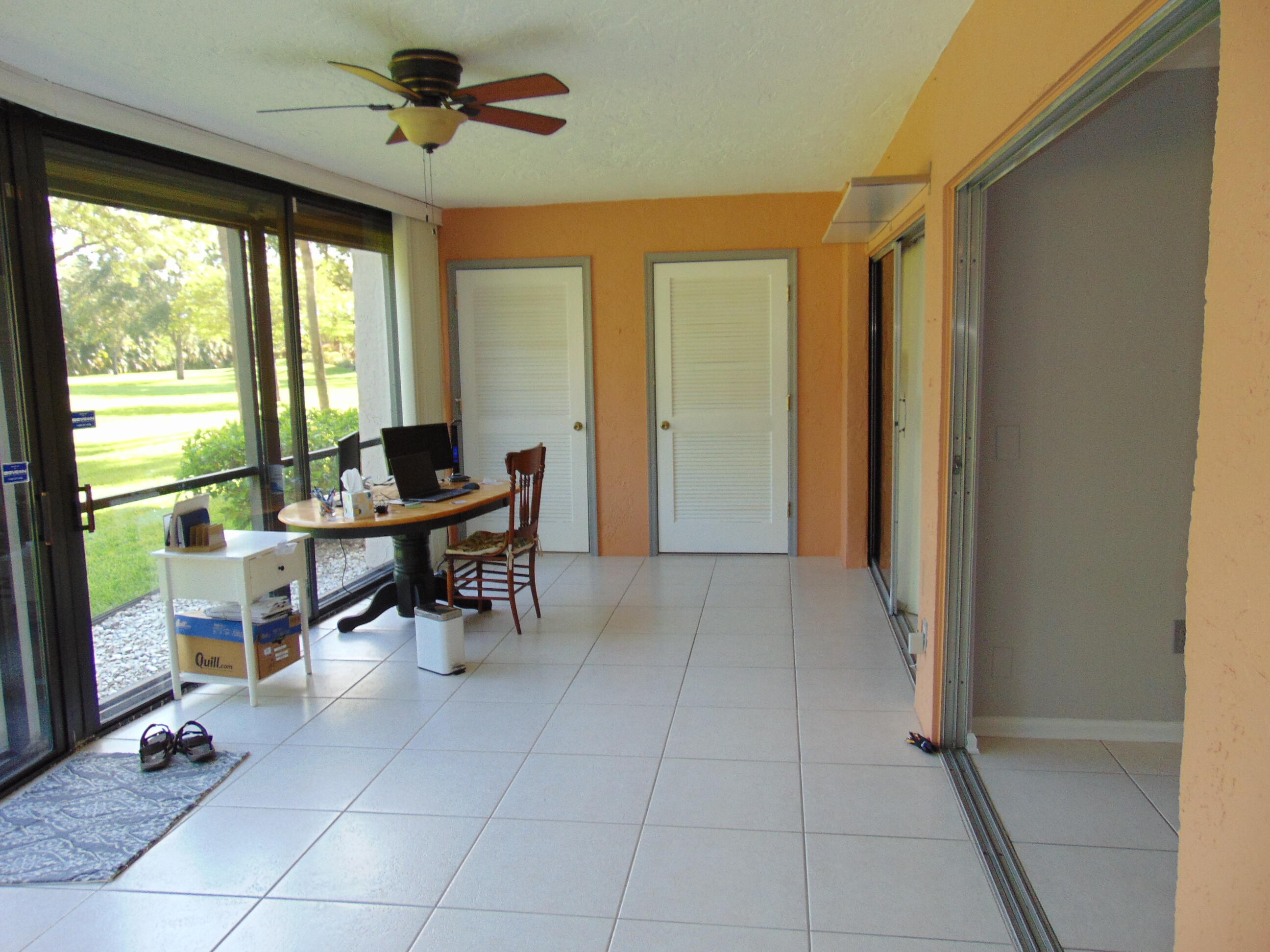 9220 Southwest 14th Street, Unit 3103 Boca Raton, FL 33428 - Photo 29 of 58 a view of a livingroom with furniture and a window
