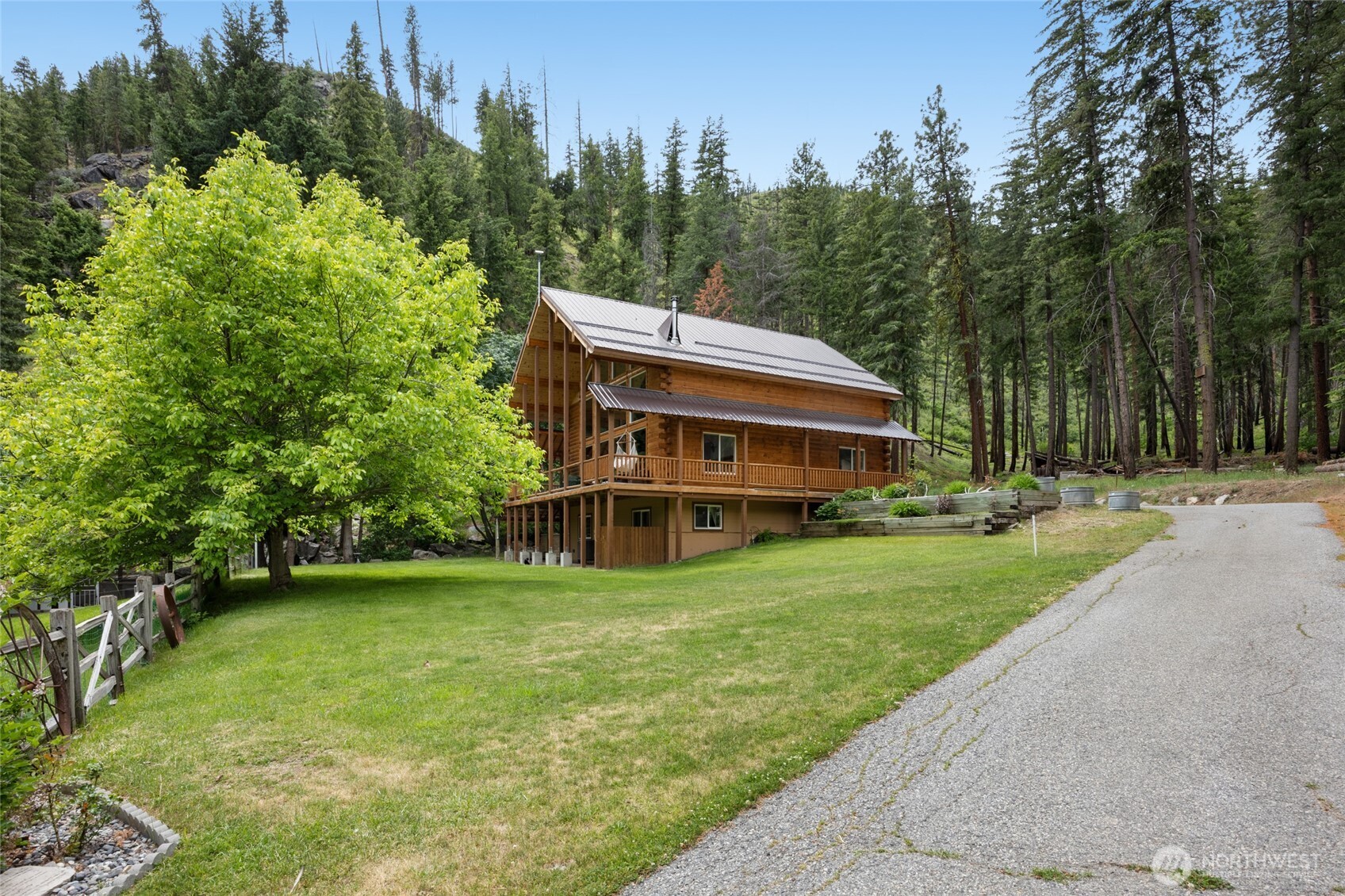 11125 Entiat River Road Entiat, WA 98822 - Photo 3 of 40 a view of a house with a yard