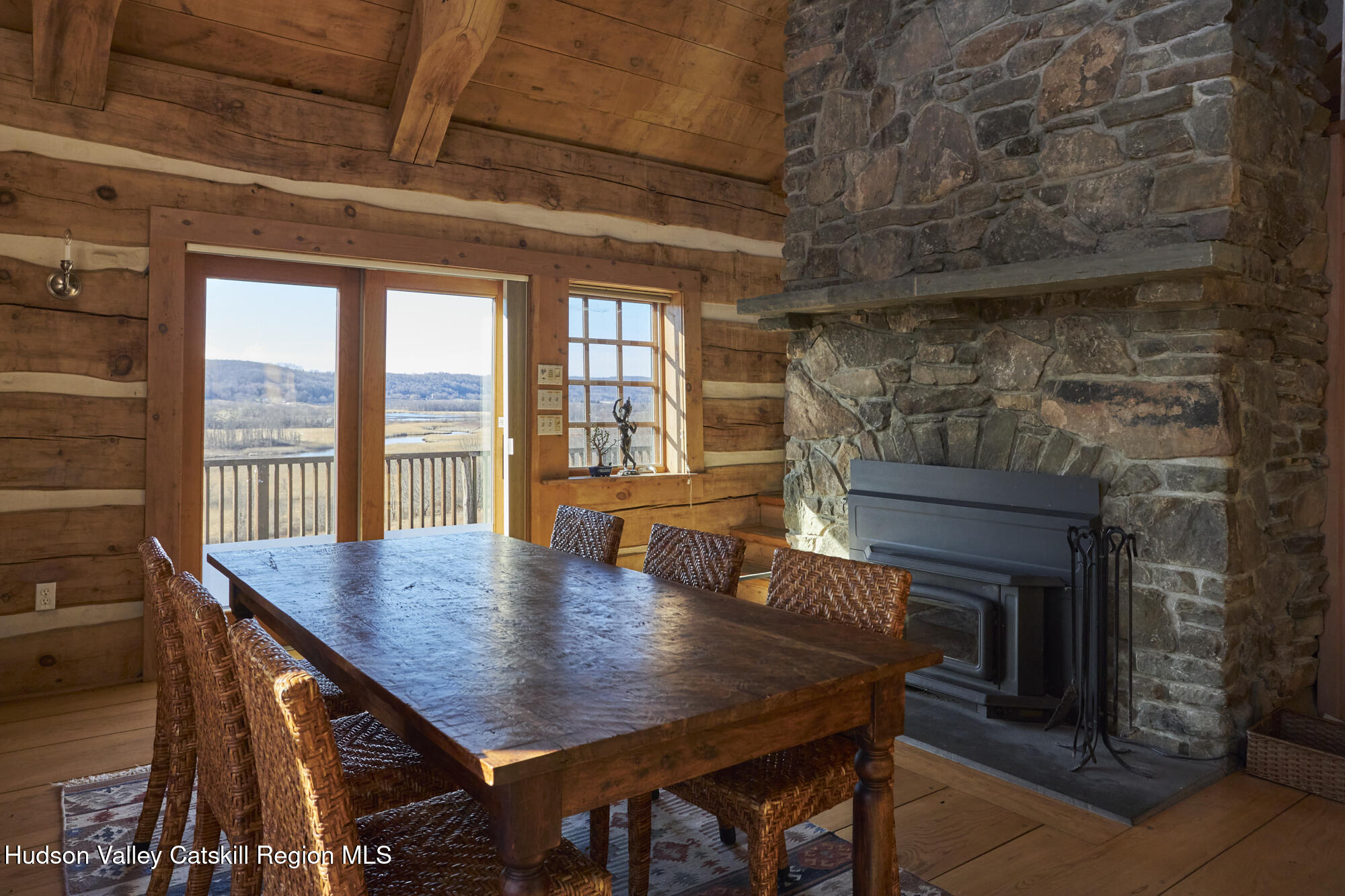 87 Kaye Road Millerton, NY 12546 - Photo 15 of 46 a view of a dining room with furniture window and wooden floor