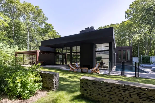 front view of a house with a swimming pool