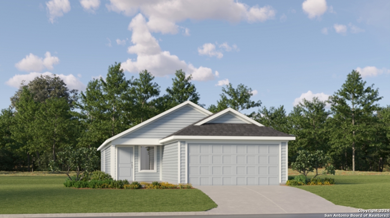 479 Sarah Way Marion, TX 78124 - Photo 1 of 1 a front view of a house with a yard and garage