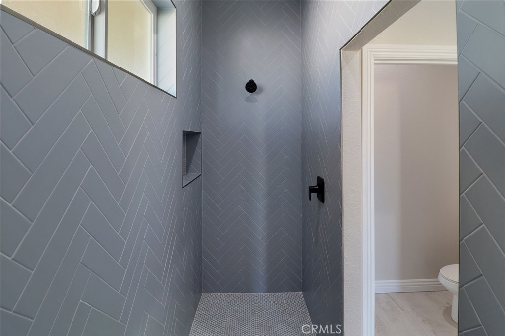 14785 Tigertail Road Apple Valley, CA 92307 - Photo 12 of 20 a bathroom with a shower
