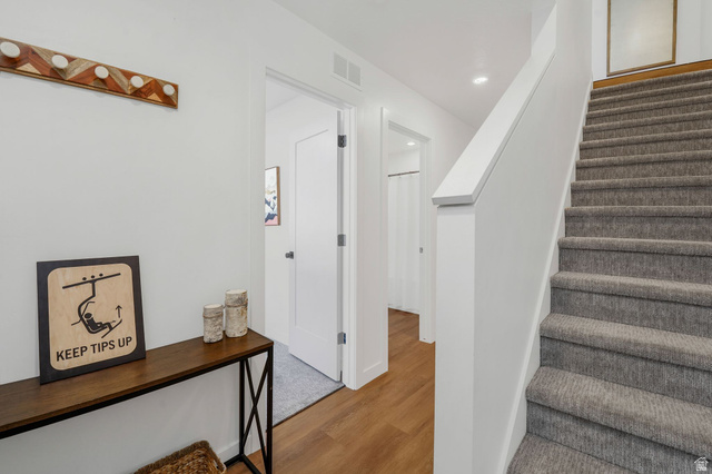493 East Alice Way Layton, UT 84041 - Photo 20 of 31 Stairs featuring wood finished floors and recessed lighting
