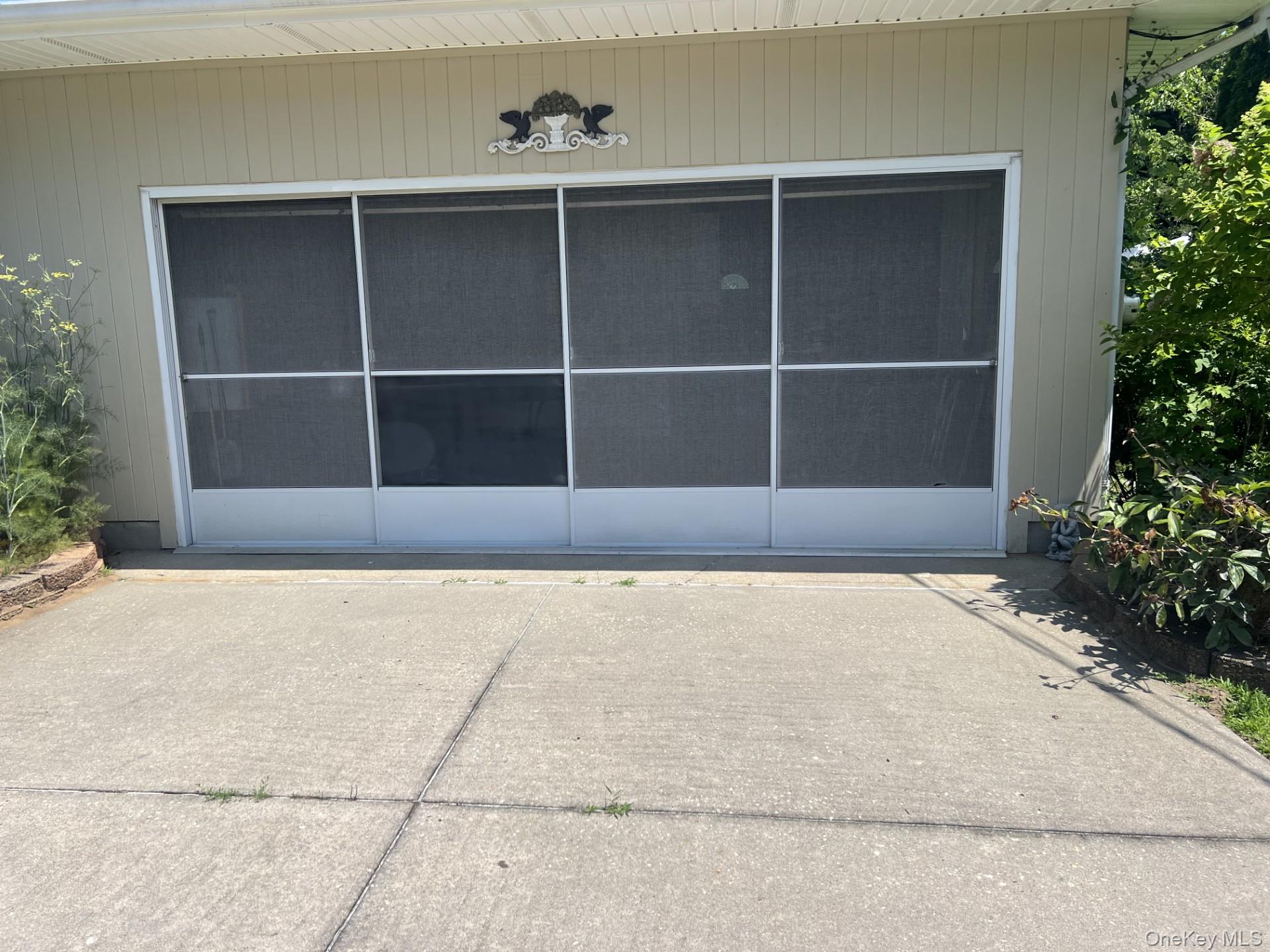215 Leon Road Southold, NY 11971 - Photo 15 of 17 Screened in Garage .