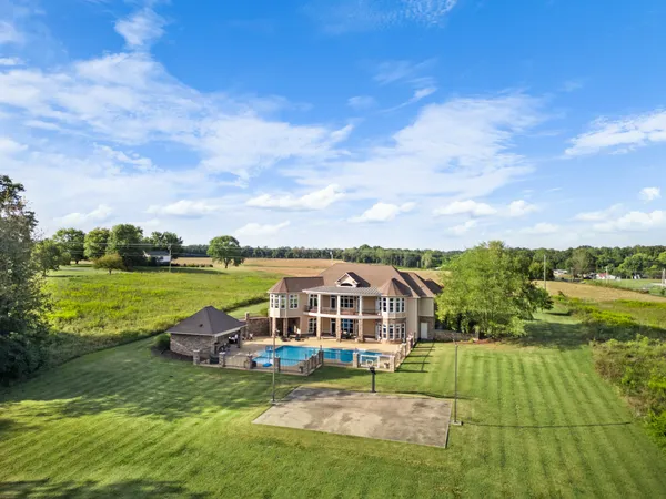 a view of a building with a swimming pool