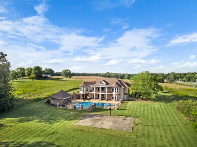 a view of a building with a swimming pool