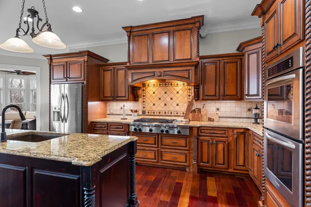 a bedroom with a bed and a table