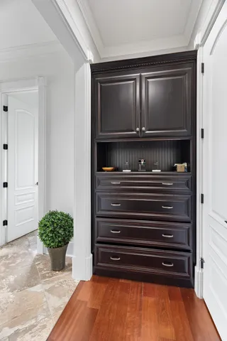 a kitchen with a stove a sink and a refrigerator