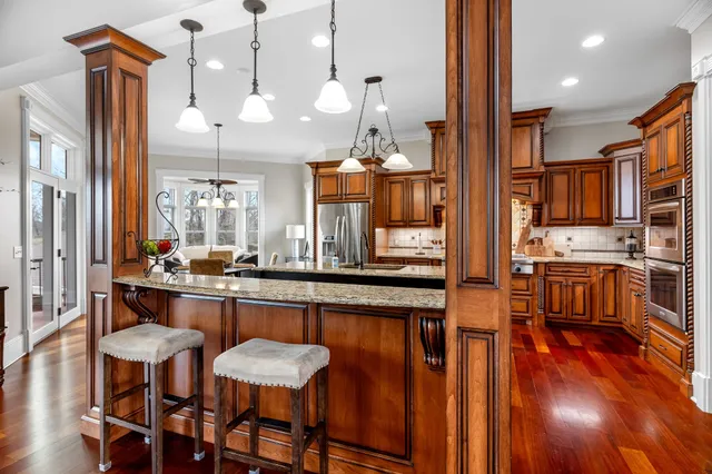 a view of a livingroom with furniture and wooden floor