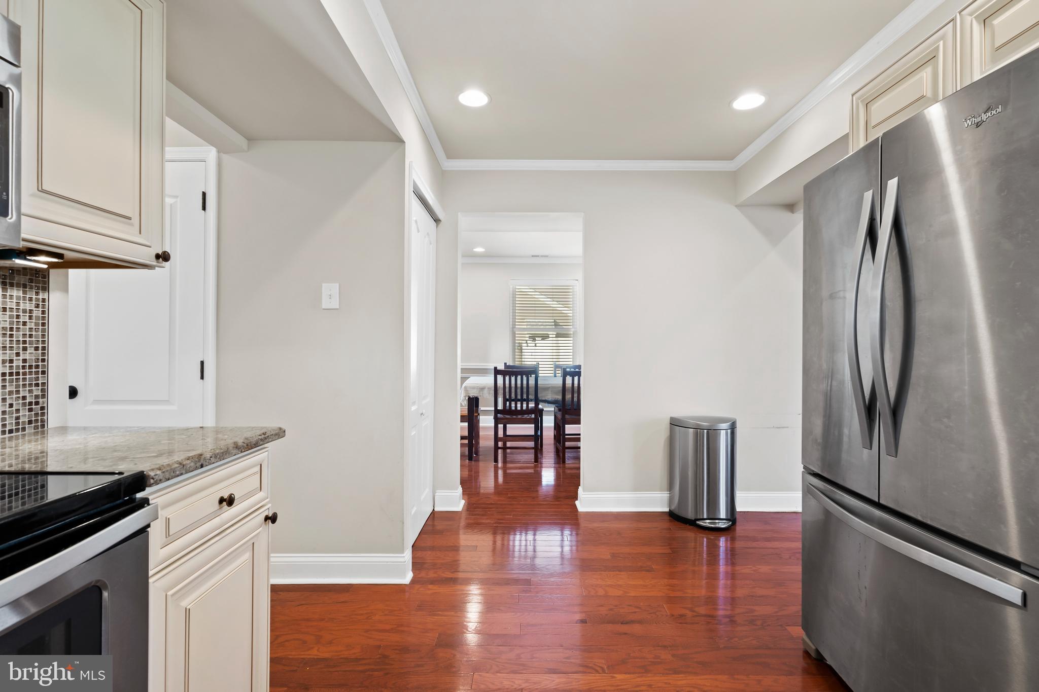 17 Alberts Way Langhorne, PA 19047 - Photo 12 of 35 a kitchen with stainless steel appliances granite countertop a refrigerator and a stove top oven