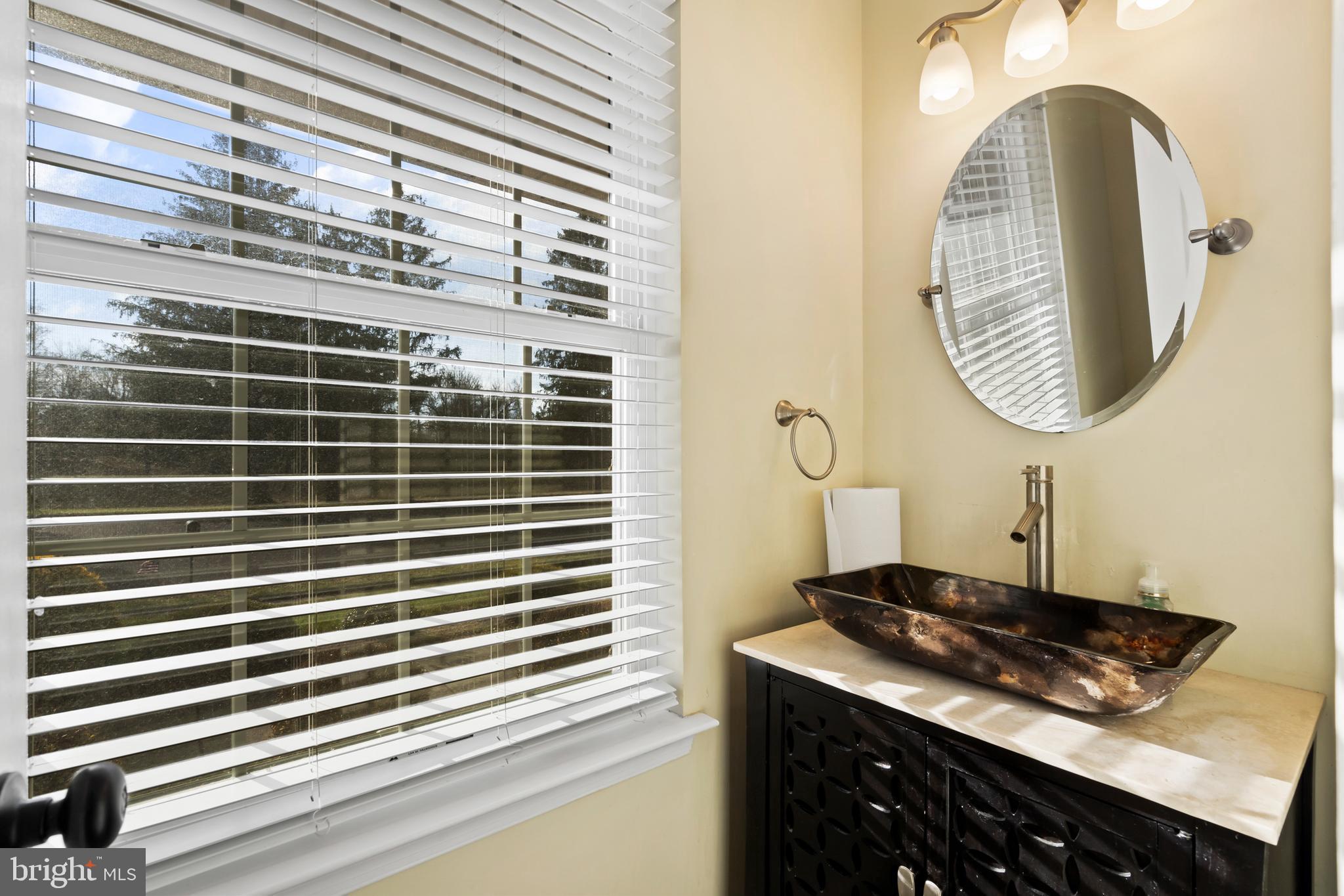 17 Alberts Way Langhorne, PA 19047 - Photo 17 of 35 a bathroom with a sink and a mirror
