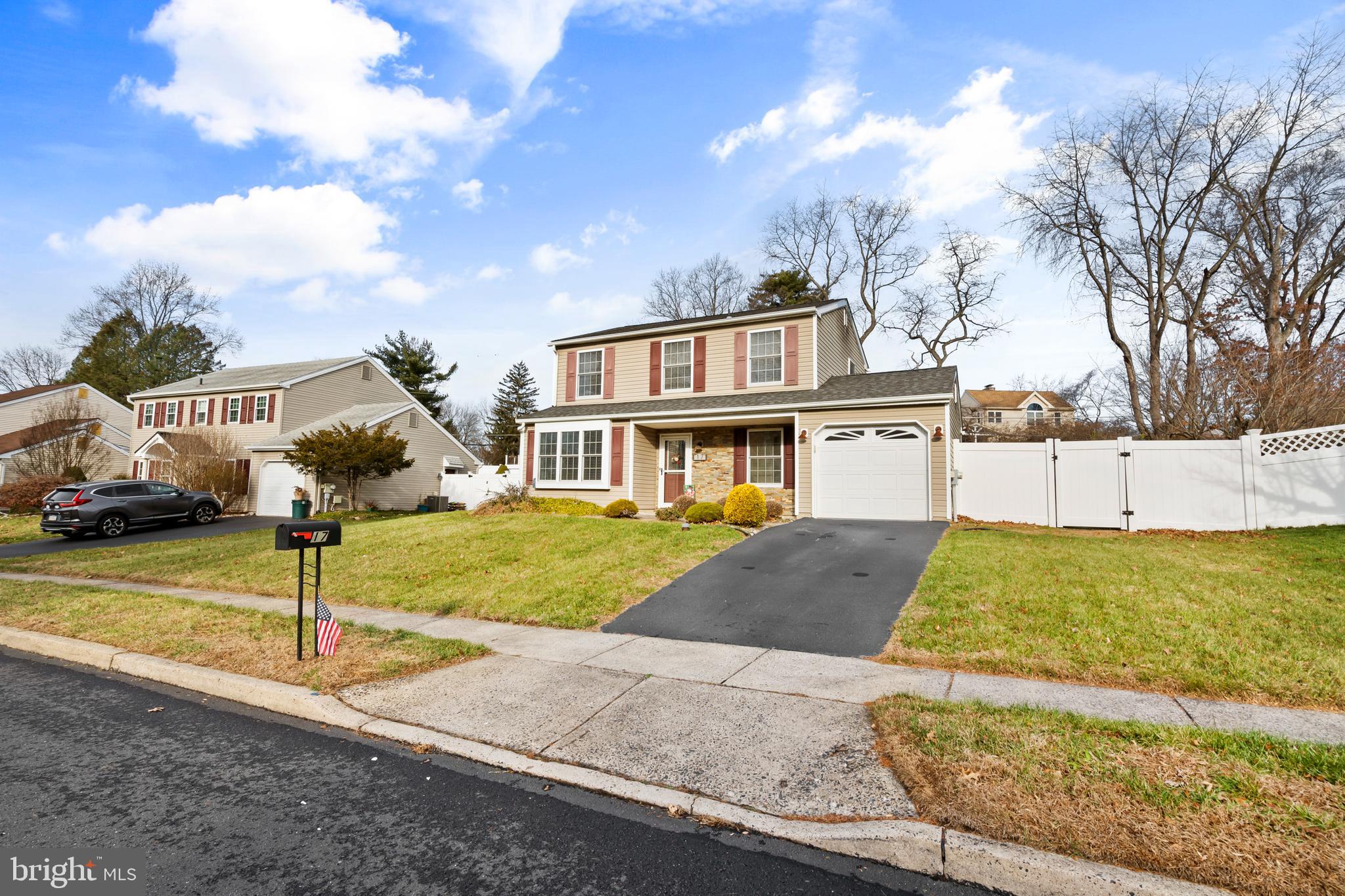 17 Alberts Way Langhorne, PA 19047 - Photo 2 of 35 a front view of a house with a yard and garage