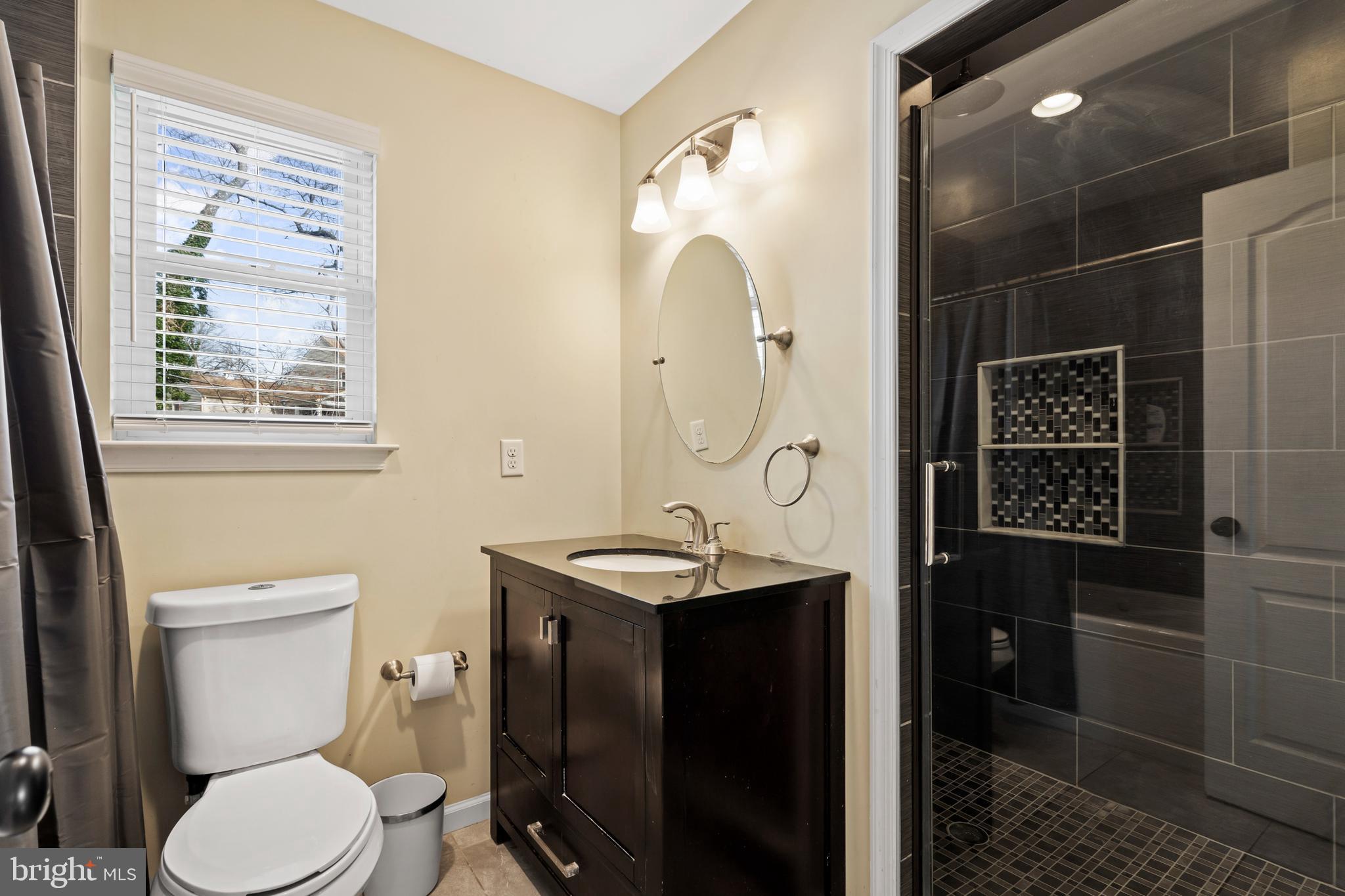 17 Alberts Way Langhorne, PA 19047 - Photo 23 of 35 a bathroom with a sink toilet and shower