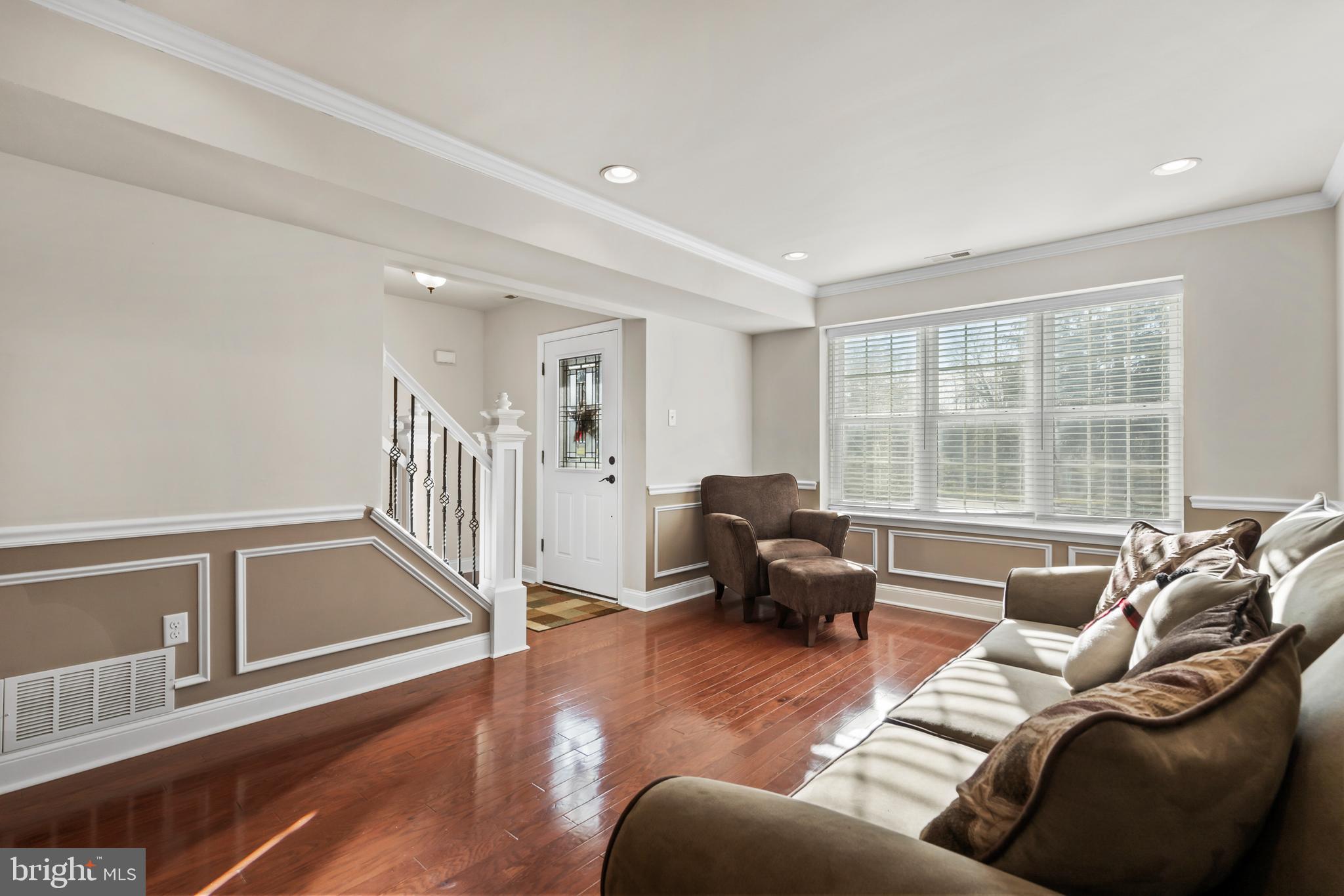 17 Alberts Way Langhorne, PA 19047 - Photo 6 of 35 a living room with furniture and a floor to ceiling window
