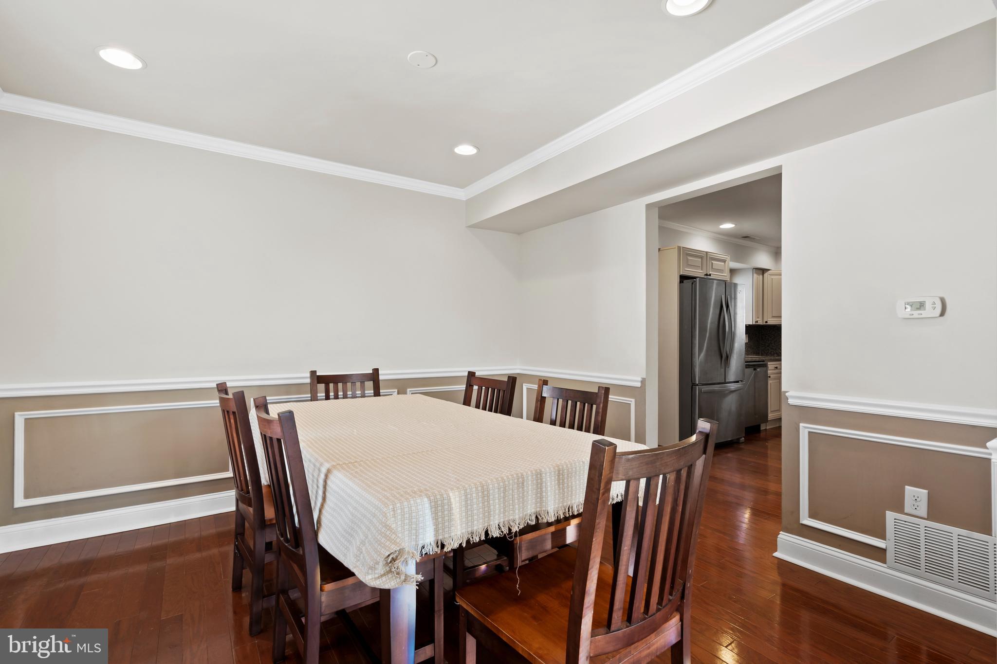 17 Alberts Way Langhorne, PA 19047 - Photo 7 of 35 a view of a dining room with furniture and wooden floor