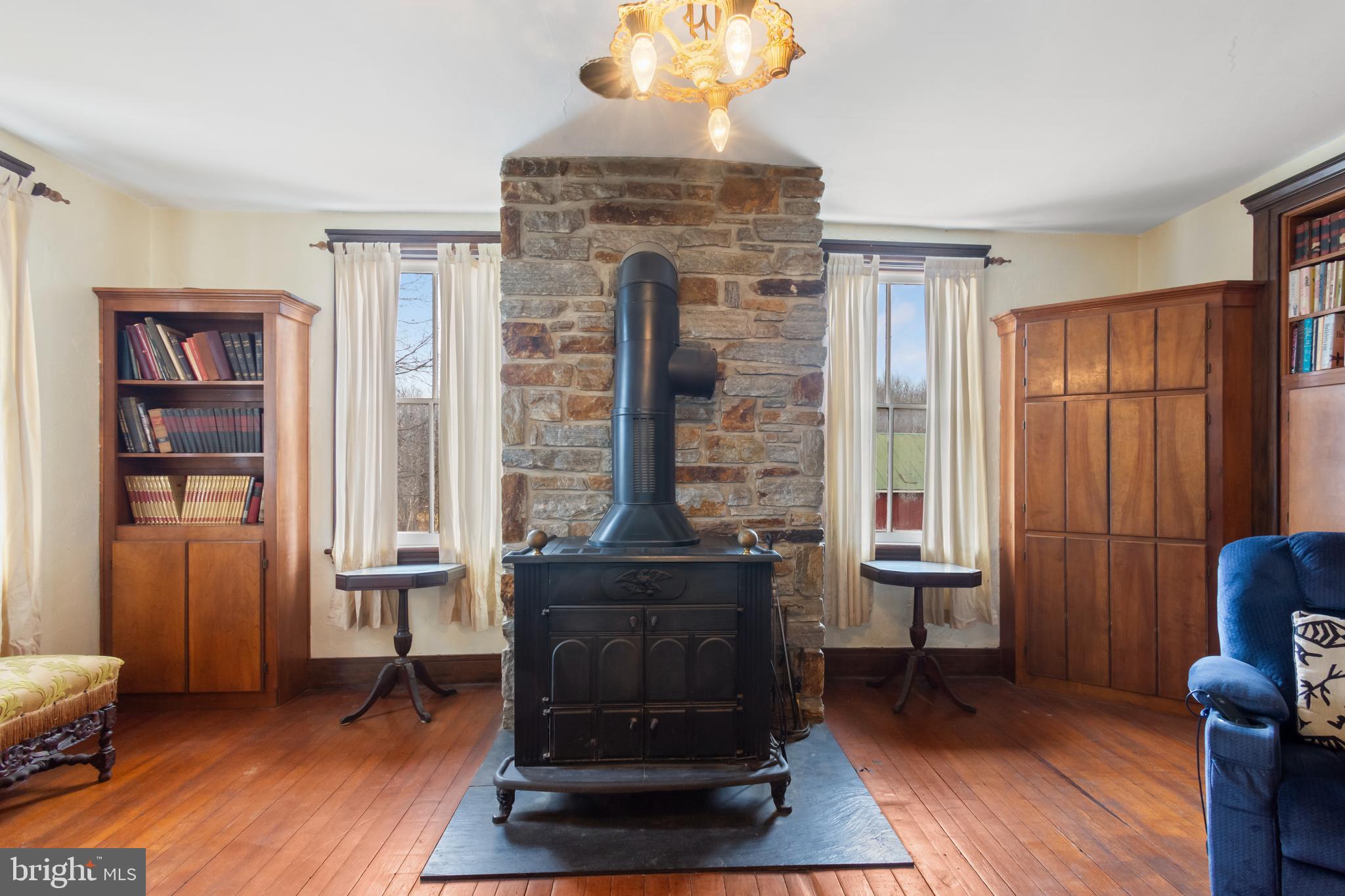 4047 Ridge Road Westminster, MD 21157 - Photo 11 of 112 a living room with furniture and a fireplace
