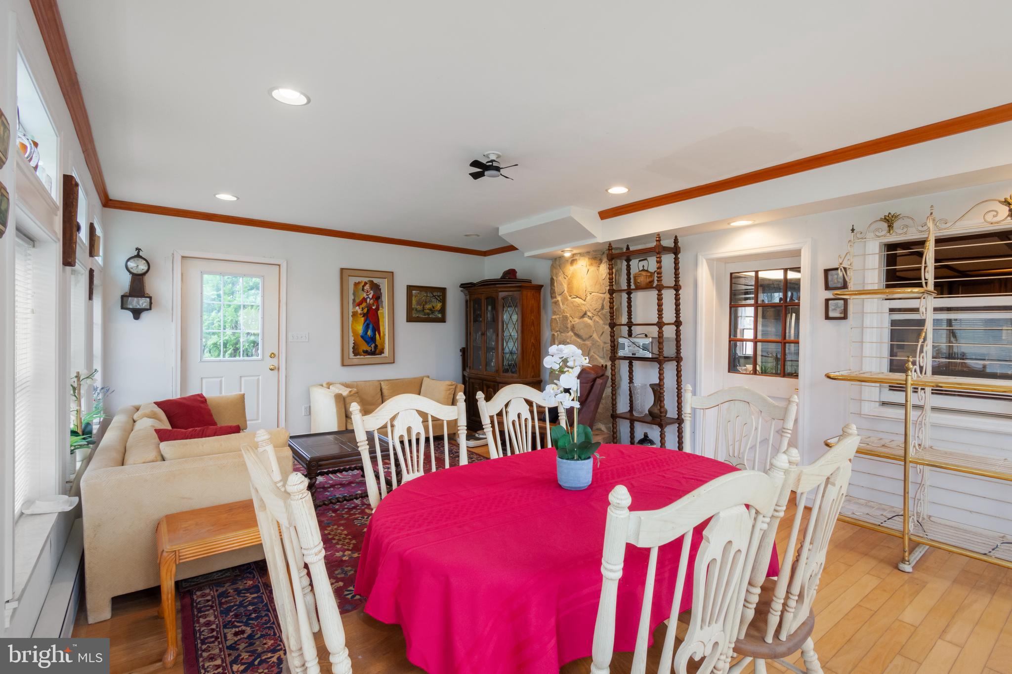 4047 Ridge Road Westminster, MD 21157 - Photo 20 of 112 a view of a dining room with furniture and wooden floor