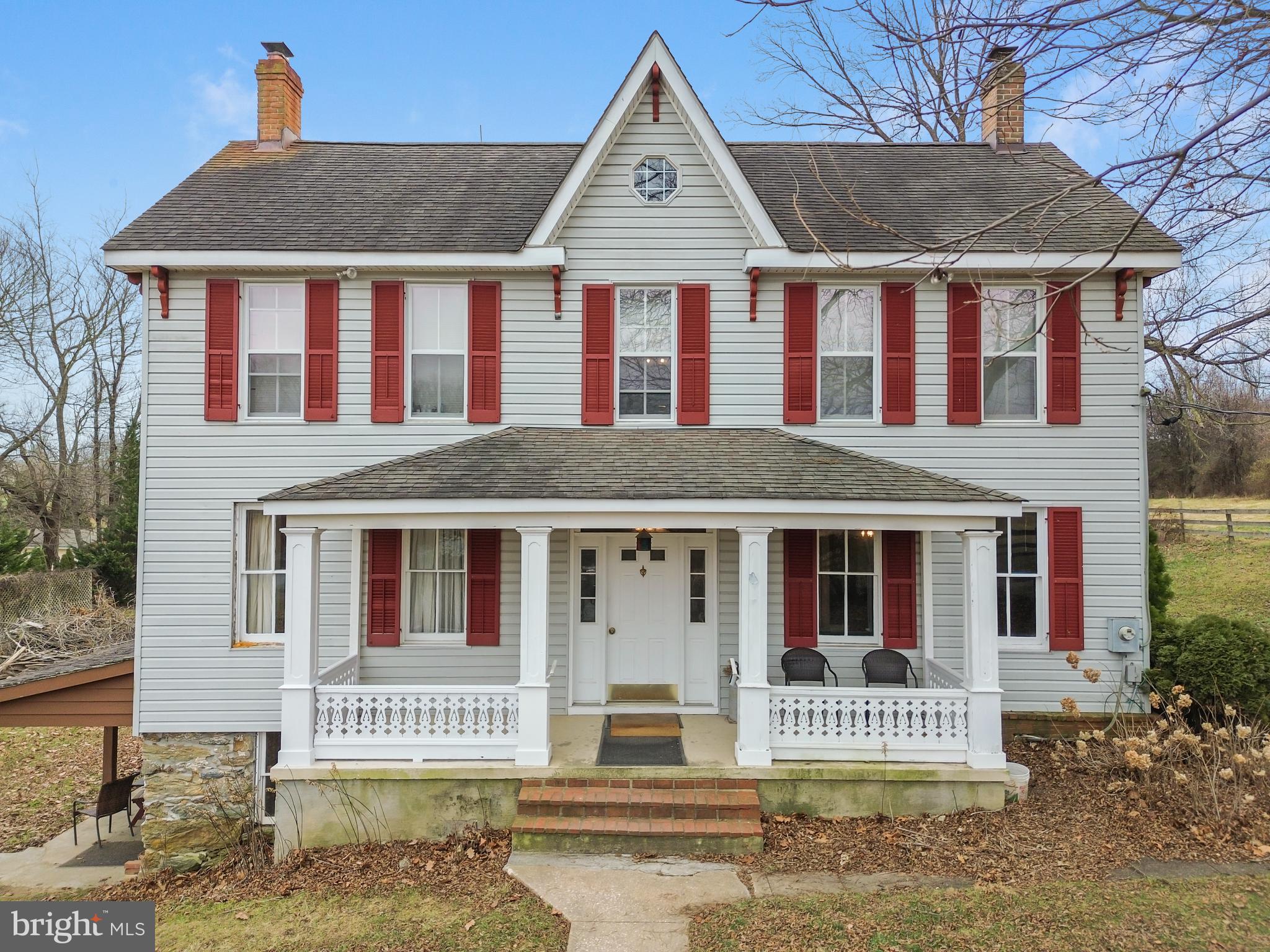 4047 Ridge Road Westminster, MD 21157 - Photo 2 of 112 a front view of a house with a yard