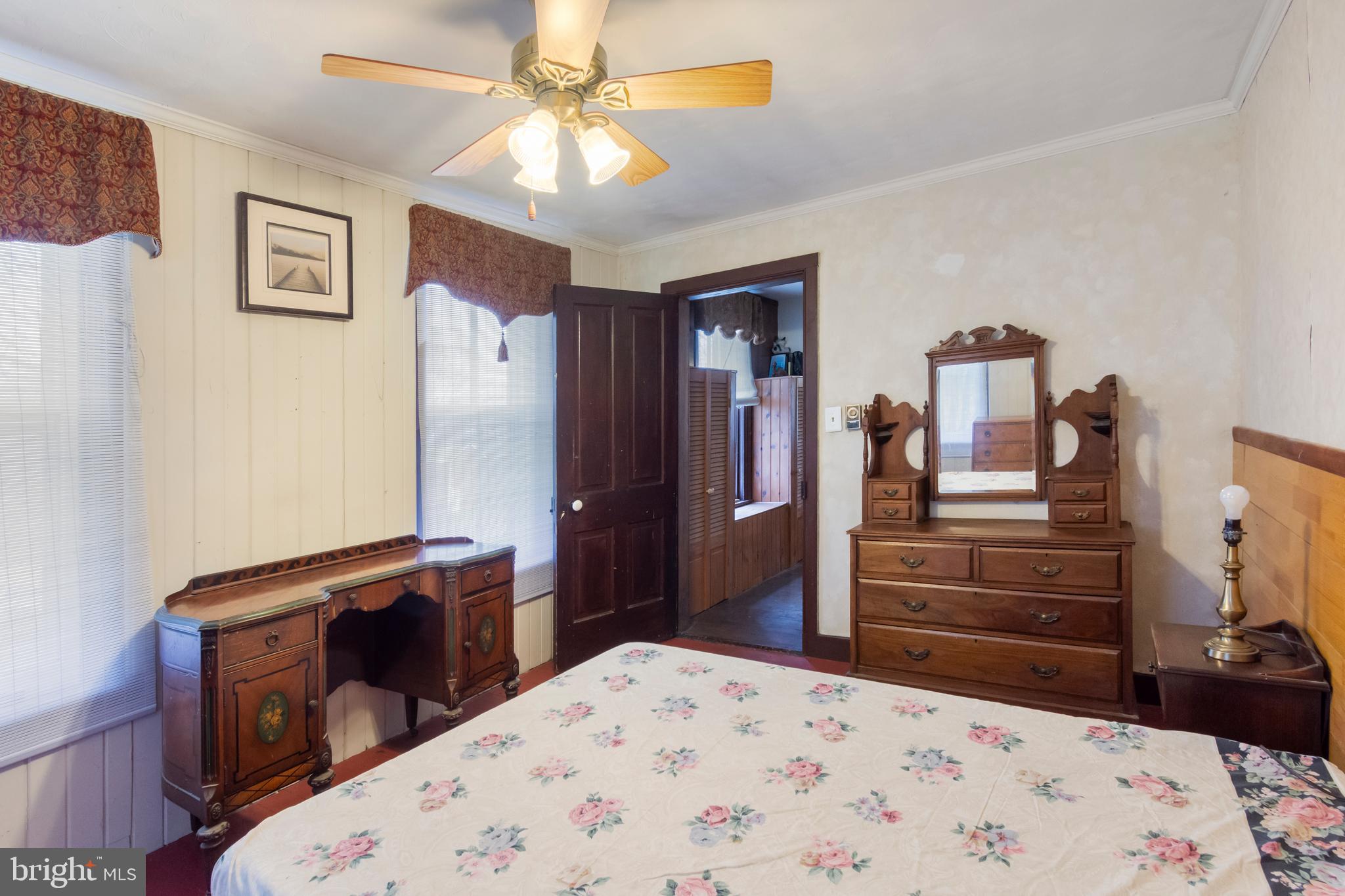 4047 Ridge Road Westminster, MD 21157 - Photo 27 of 112 a bedroom with a bed and a dresser
