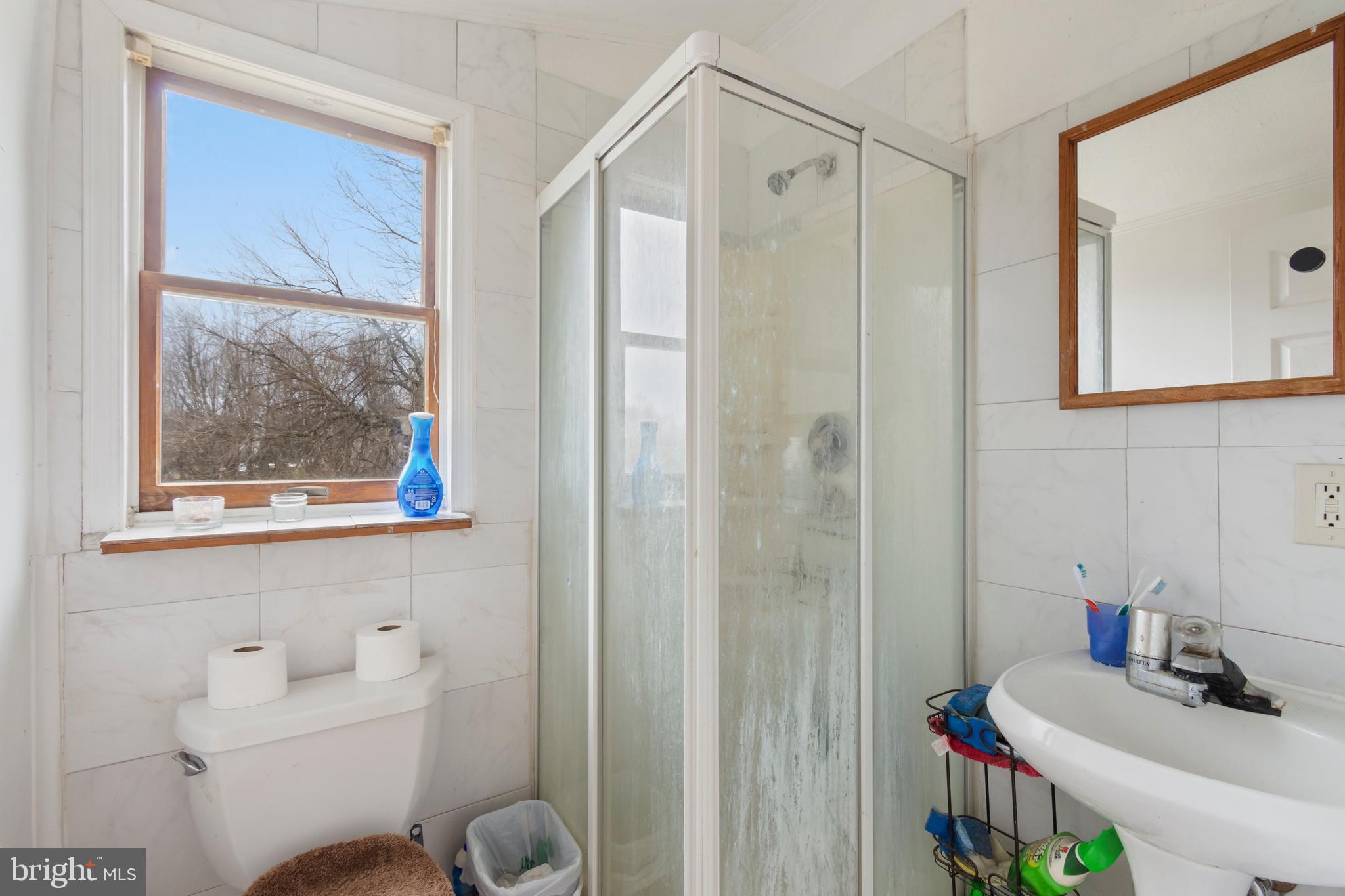 4047 Ridge Road Westminster, MD 21157 - Photo 35 of 112 a bathroom with a sink toilet and shower