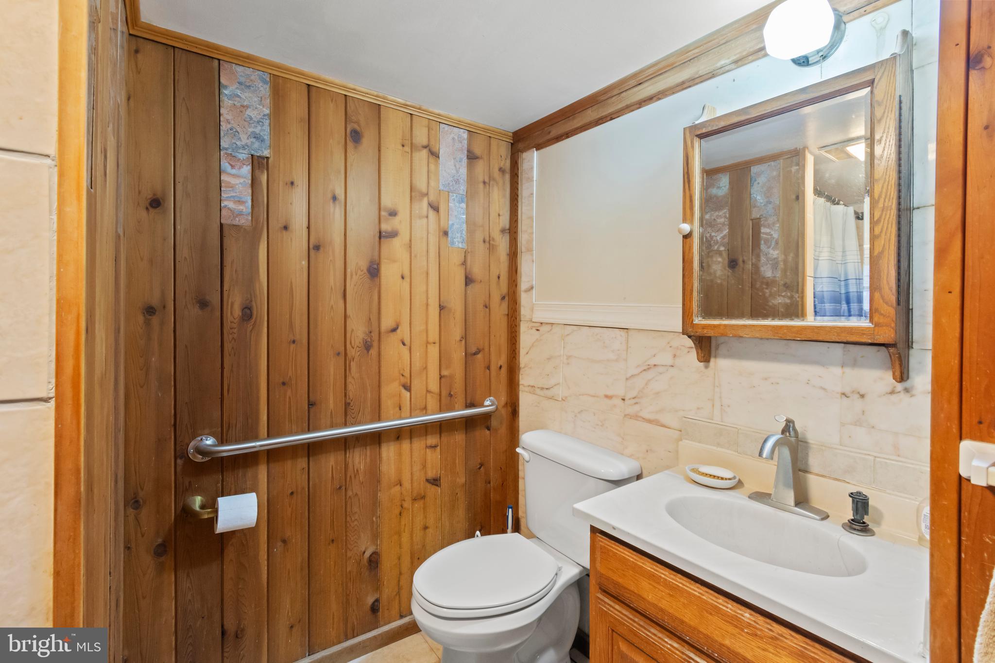 4047 Ridge Road Westminster, MD 21157 - Photo 39 of 112 a bathroom with a sink a toilet and shower