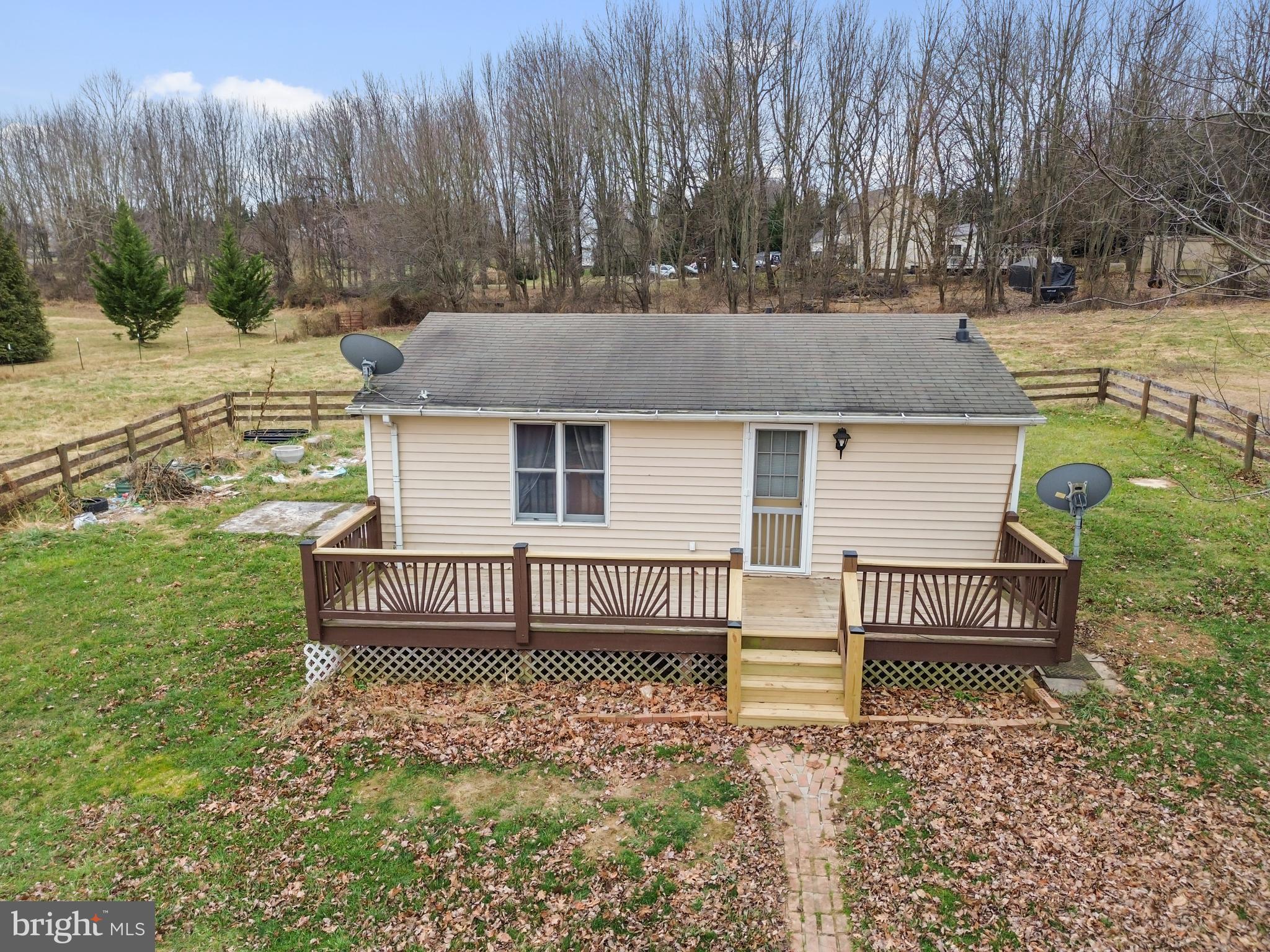 4047 Ridge Road Westminster, MD 21157 - Photo 85 of 112 a front view of a house with a yard