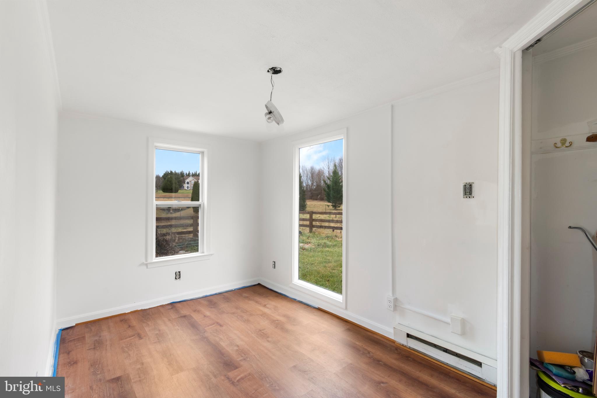 4047 Ridge Road Westminster, MD 21157 - Photo 88 of 112 a view of a room with window and hardwood floor