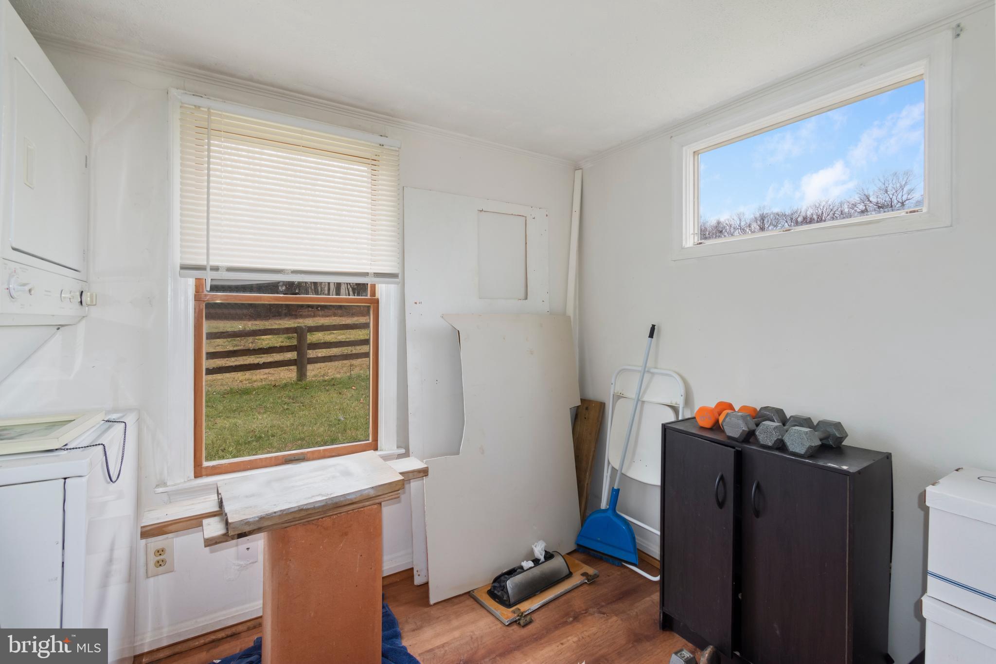 4047 Ridge Road Westminster, MD 21157 - Photo 91 of 112 a view of workspace with wooden floor and window