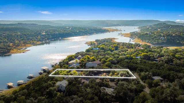 a view of an ocean and city