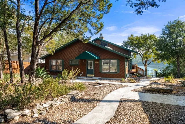 a house with trees in front of it