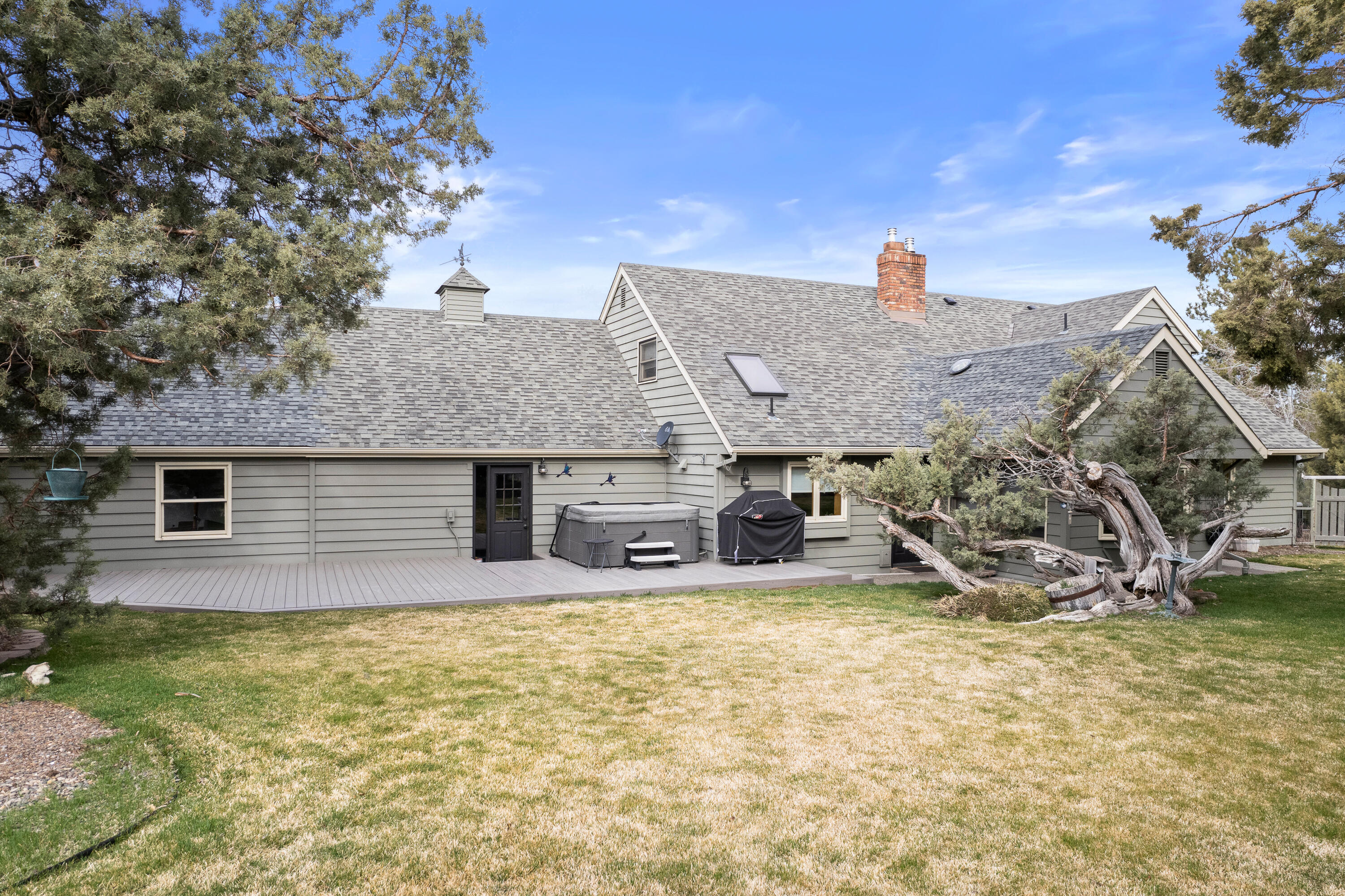 70030 Meadow View Road Sisters, OR 97759 - Photo 28 of 43 a view of a house with a yard and sitting area