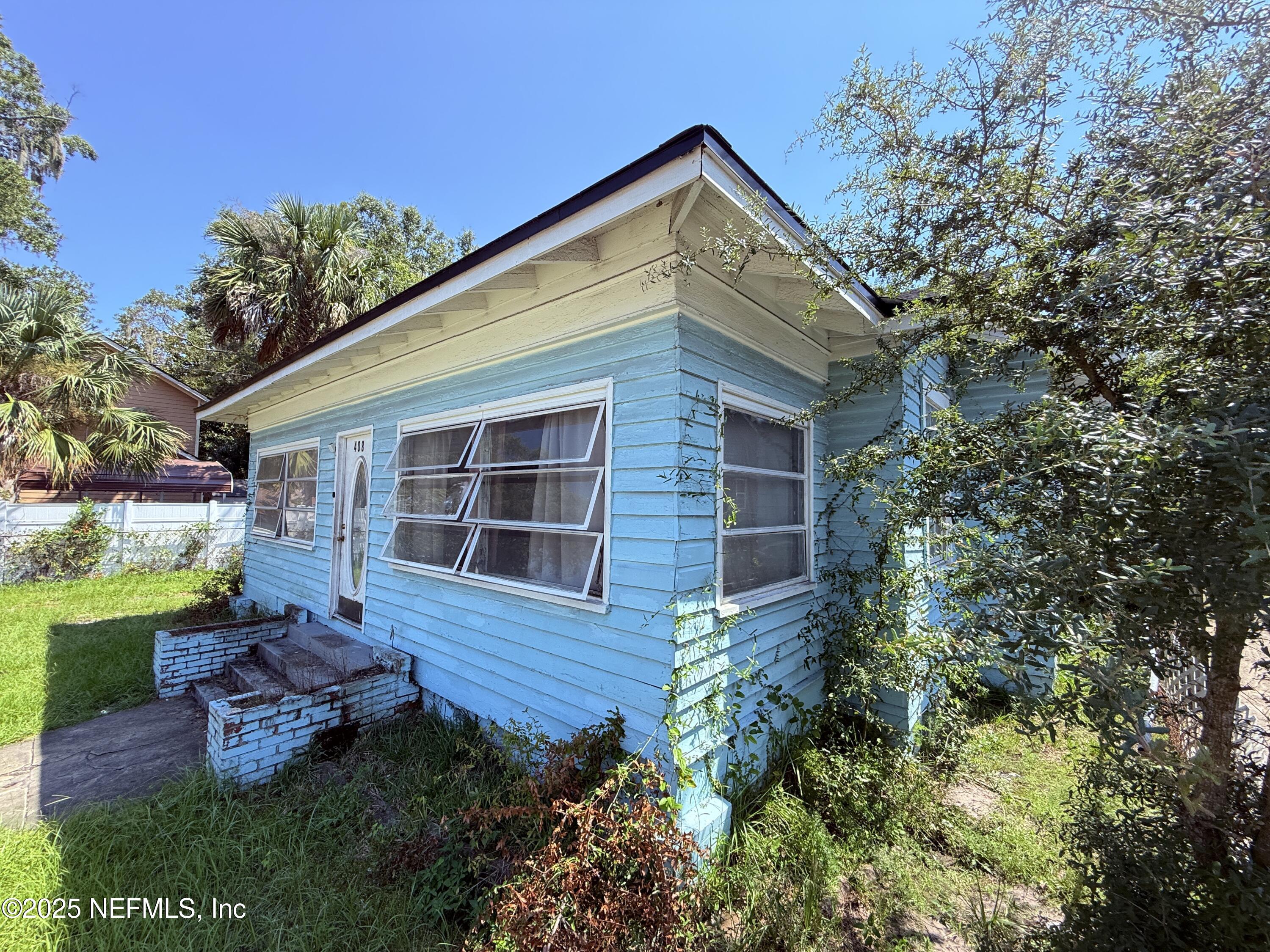 408 West 23rd Street Jacksonville, FL 32206 - Photo 44 of 45 a view of a house with a yard