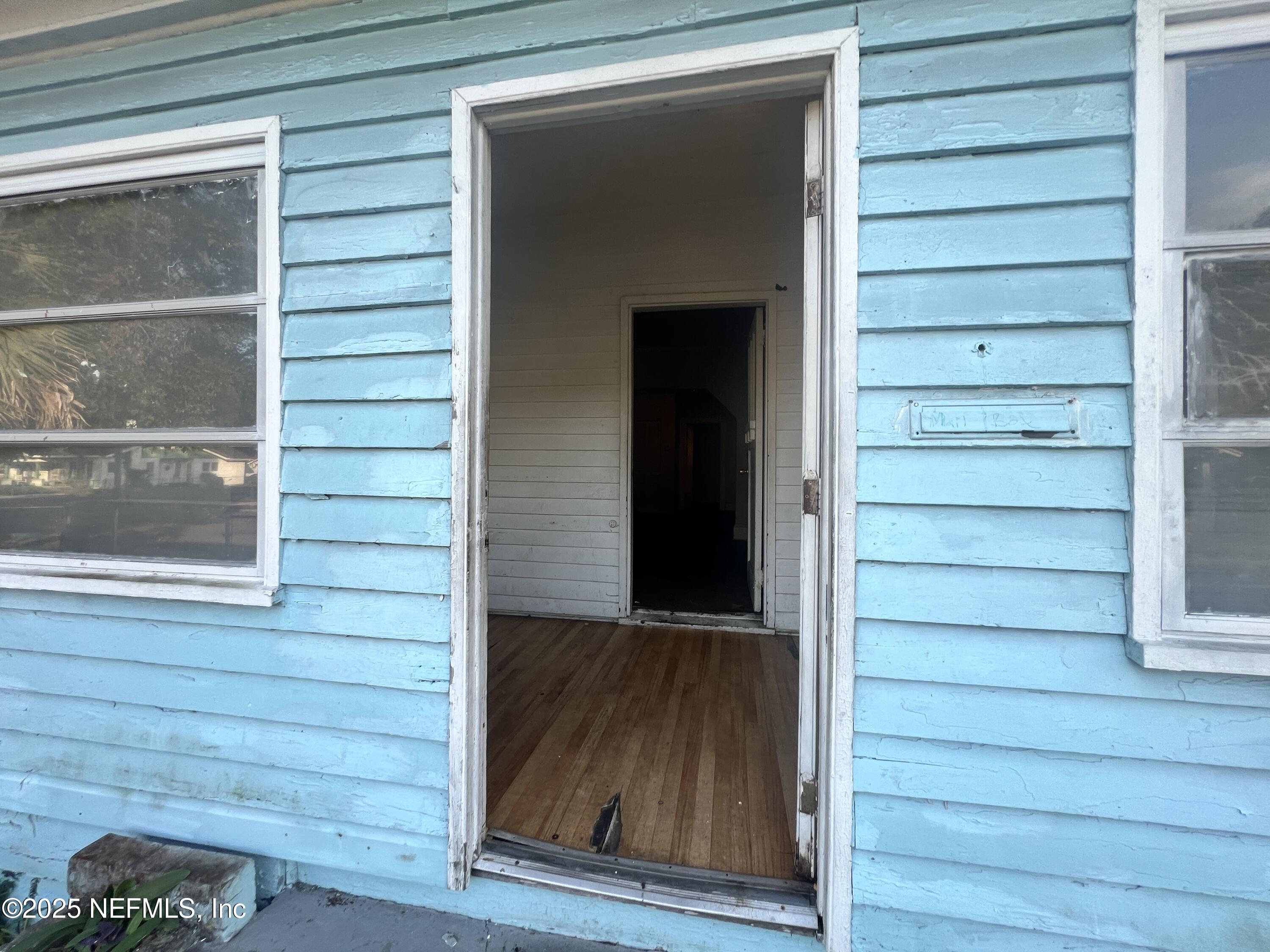408 West 23rd Street Jacksonville, FL 32206 - Photo 6 of 45 a view of front door and wooden door
